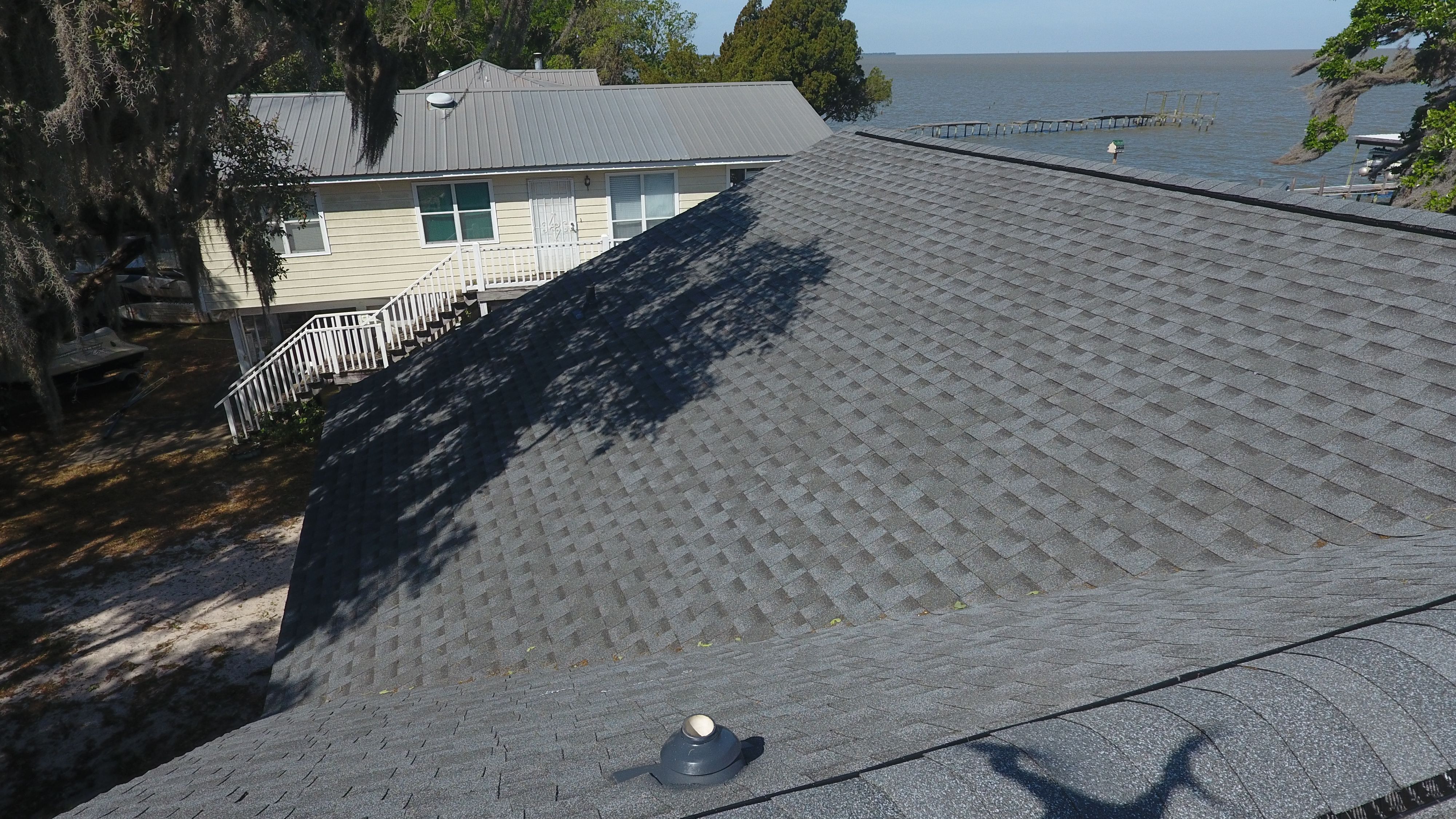 Residential Roofing Installation using Roof Replacement by American Roofing & Construction LLC