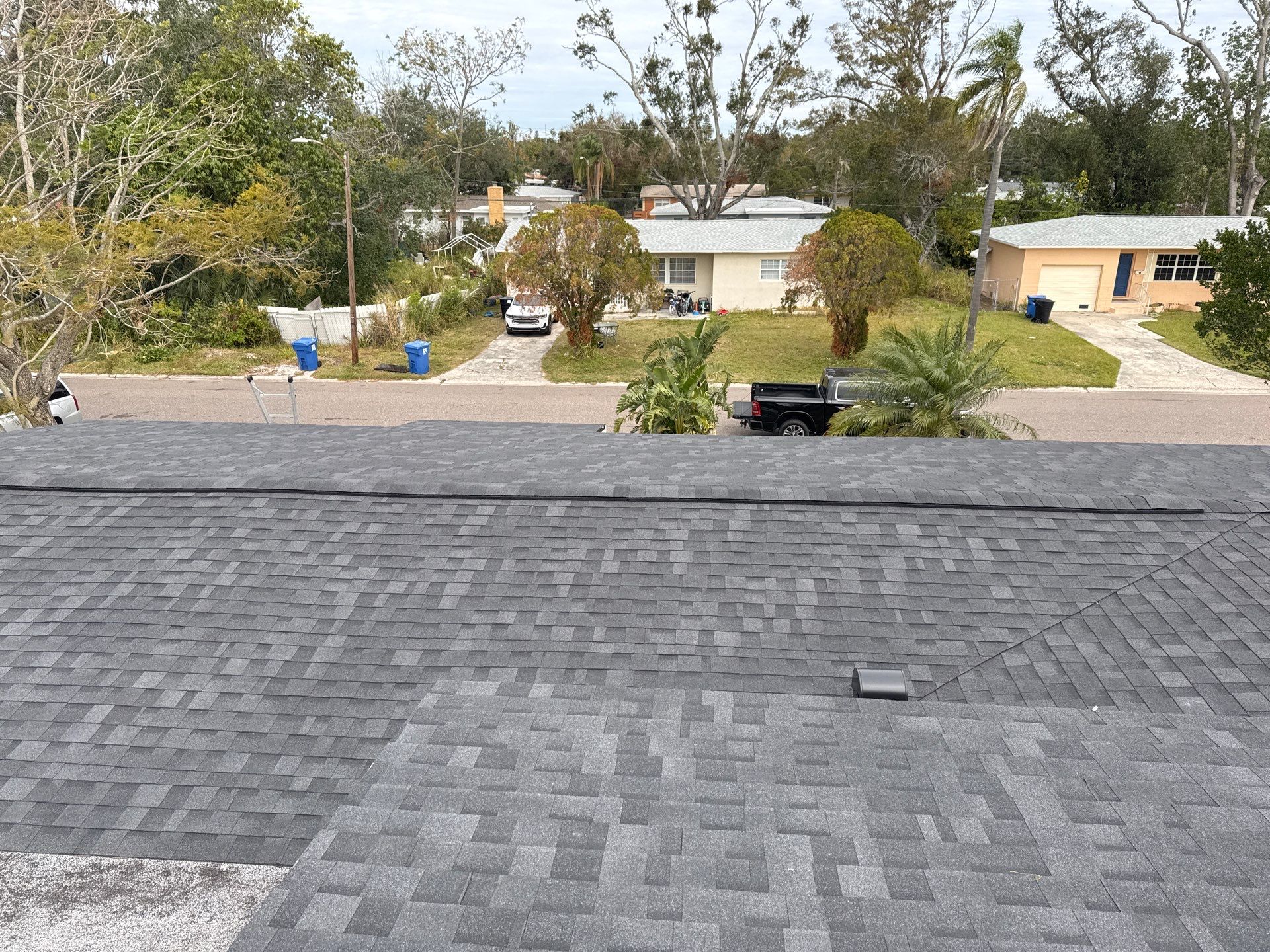Estate Gray Shingles by Reimagine Roofing