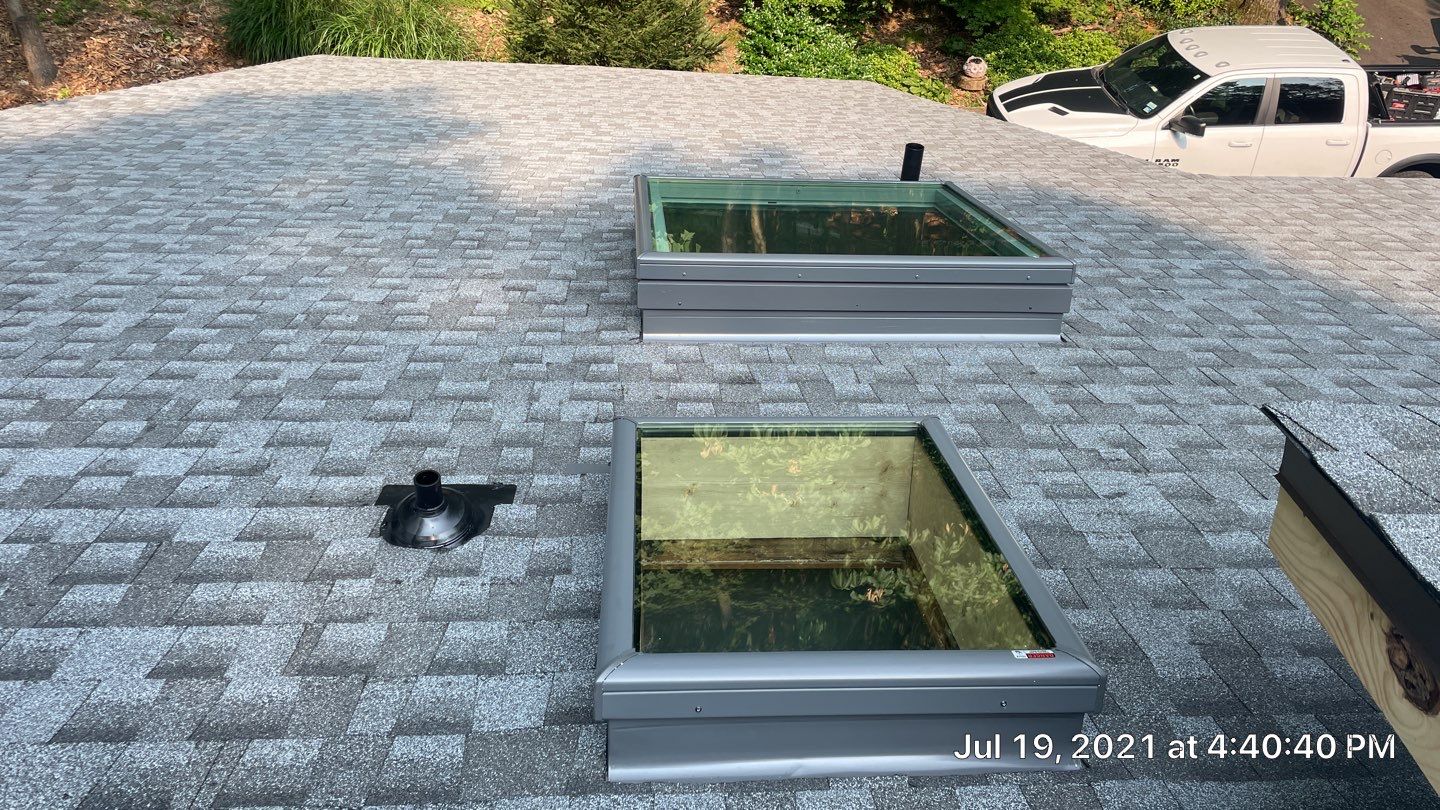 Deckhouse Roof Replacement by American Home Contractors