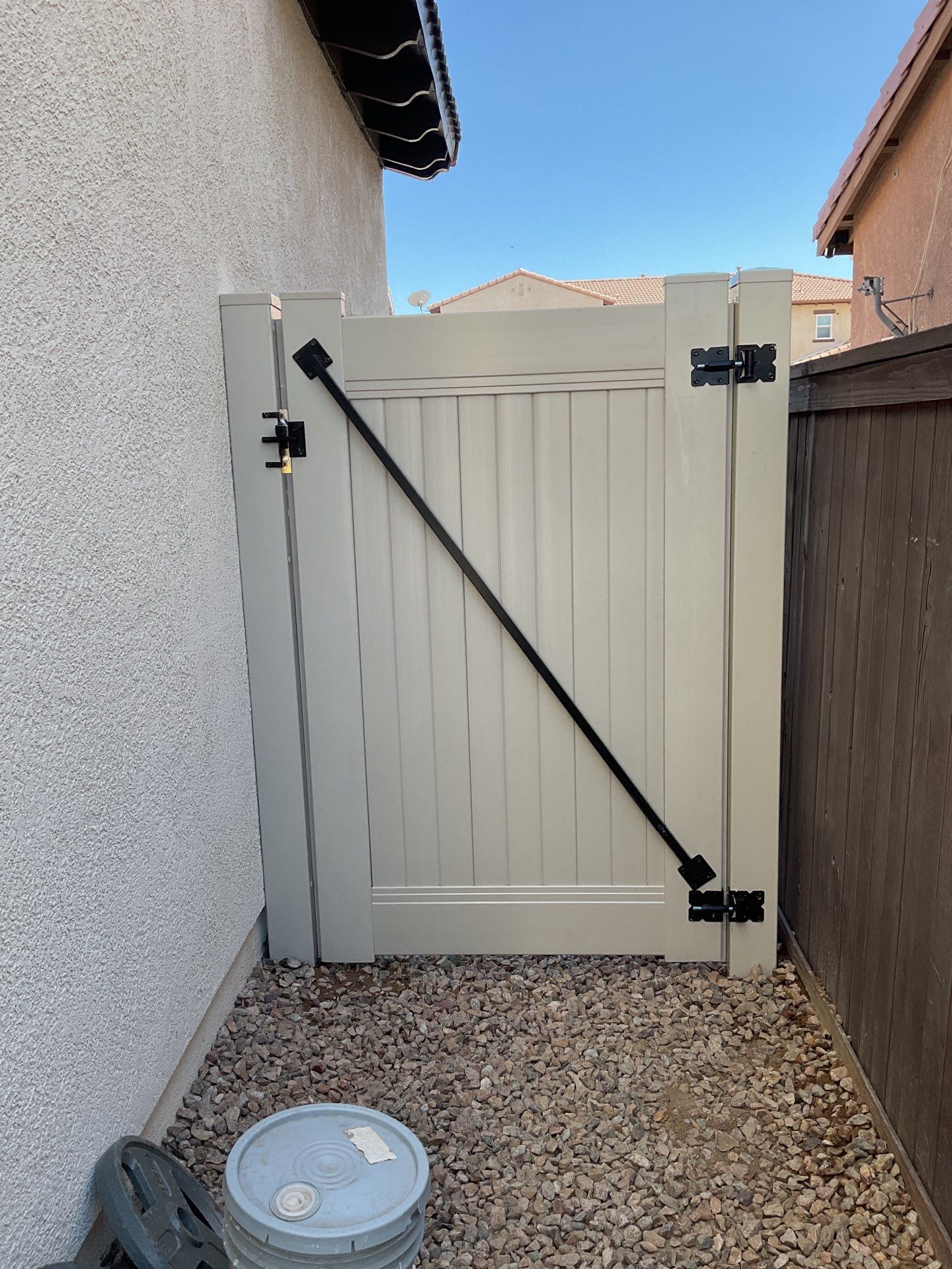 Gate installation using Vinyl by Fence Guys Inc.