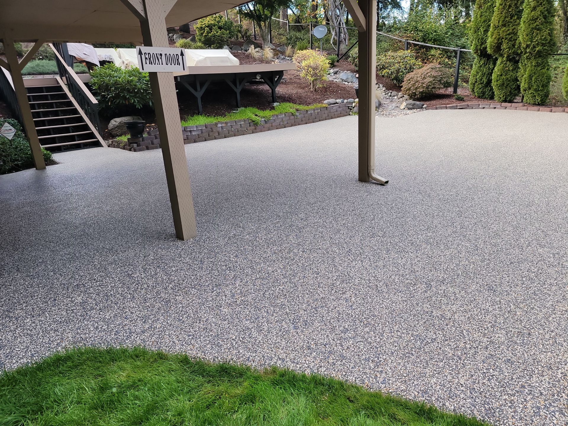 Walkway and driveway by Concrete Coating Experts Inc.