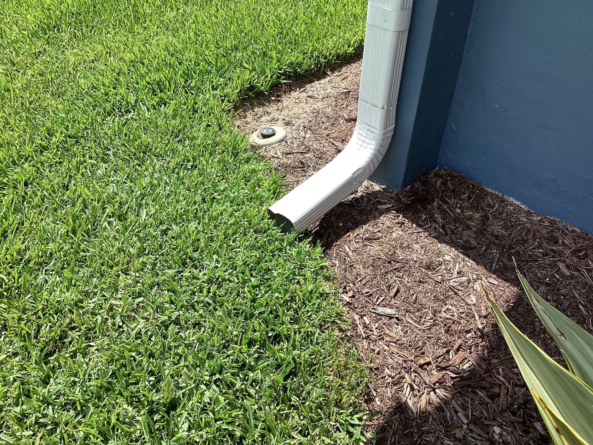 White Downspouts and Gutters Combo in Punta Gorda FL by Gutter Professors