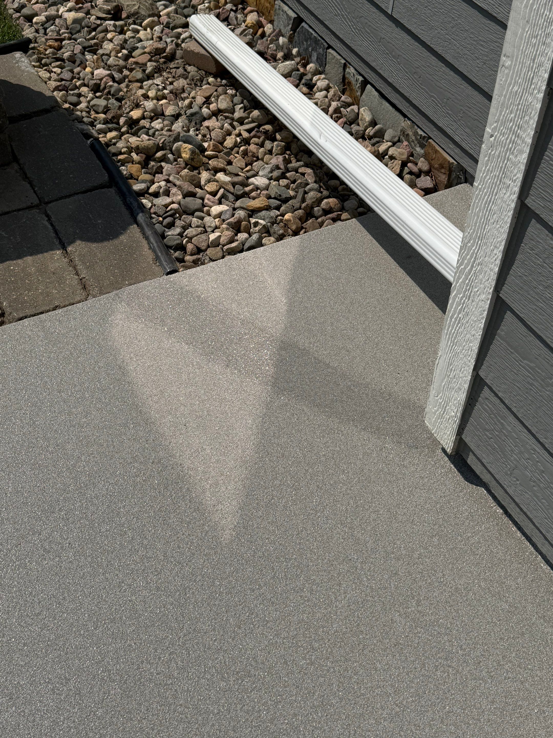 Concrete Patio Coating with Fuzzy Wool Finish in Sioux Falls by Select Painting, Coatings & Garage Cabinets