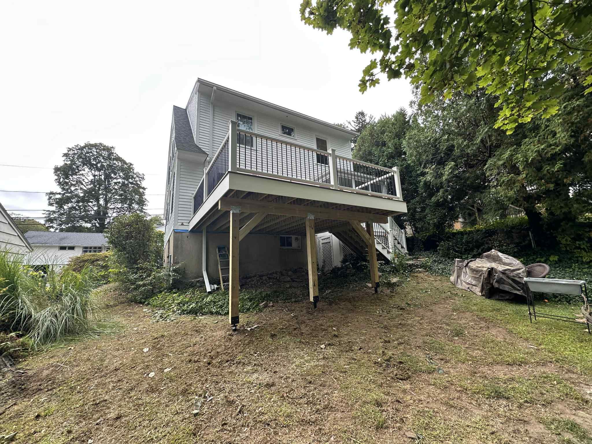 Deck Replacement Using Trex Lineage Jasper, Transcend White Railings by DiGiorgi Roofing and Siding Inc
