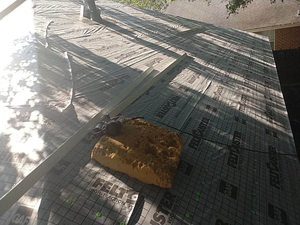 Residential Roofing Installation using Roof Replacement by American Roofing & Construction LLC