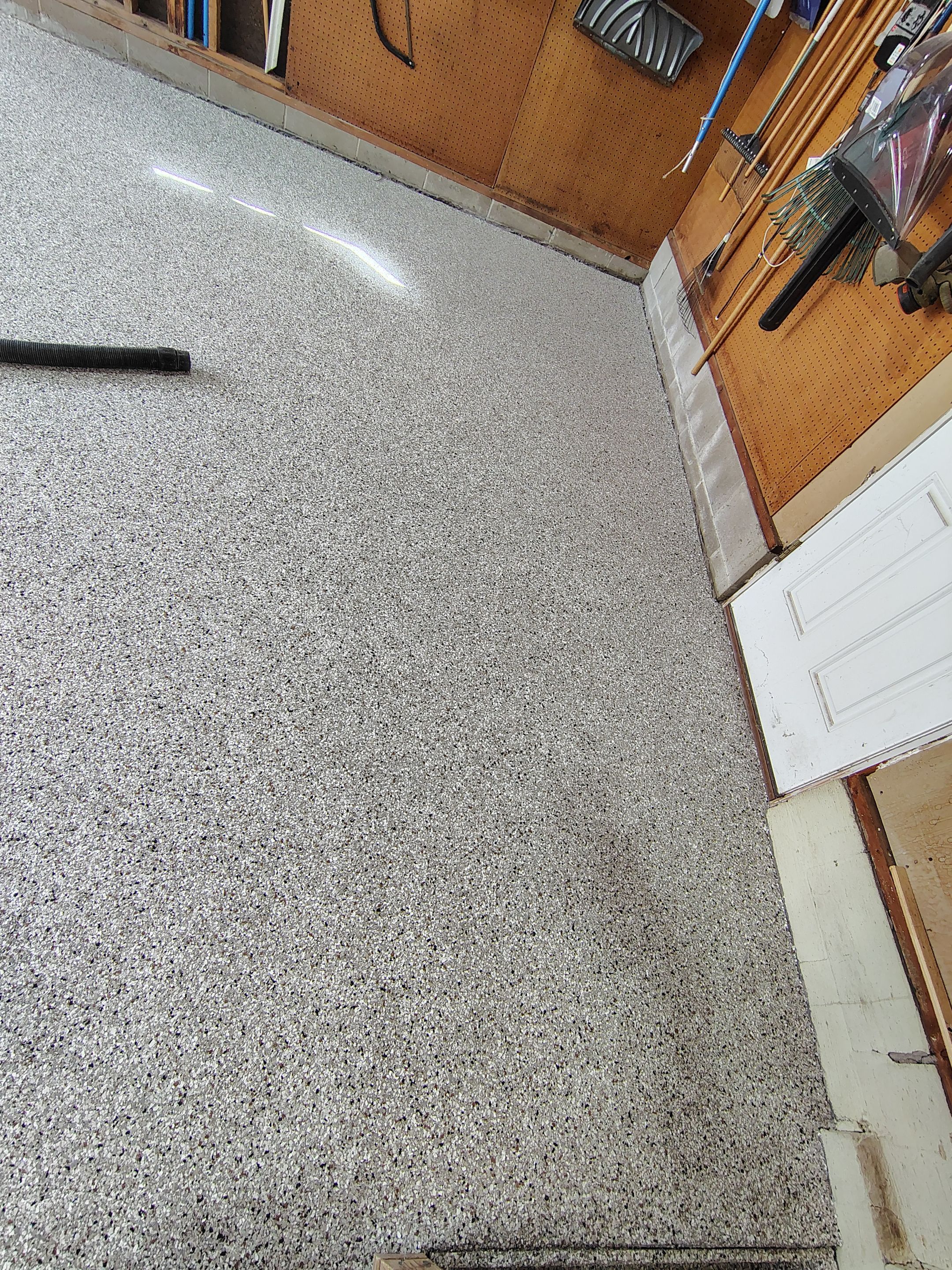 Sioux Falls Garage Epoxy Floor Installation and Concrete Crack Repair by Select Painting, Coatings & Garage Cabinets