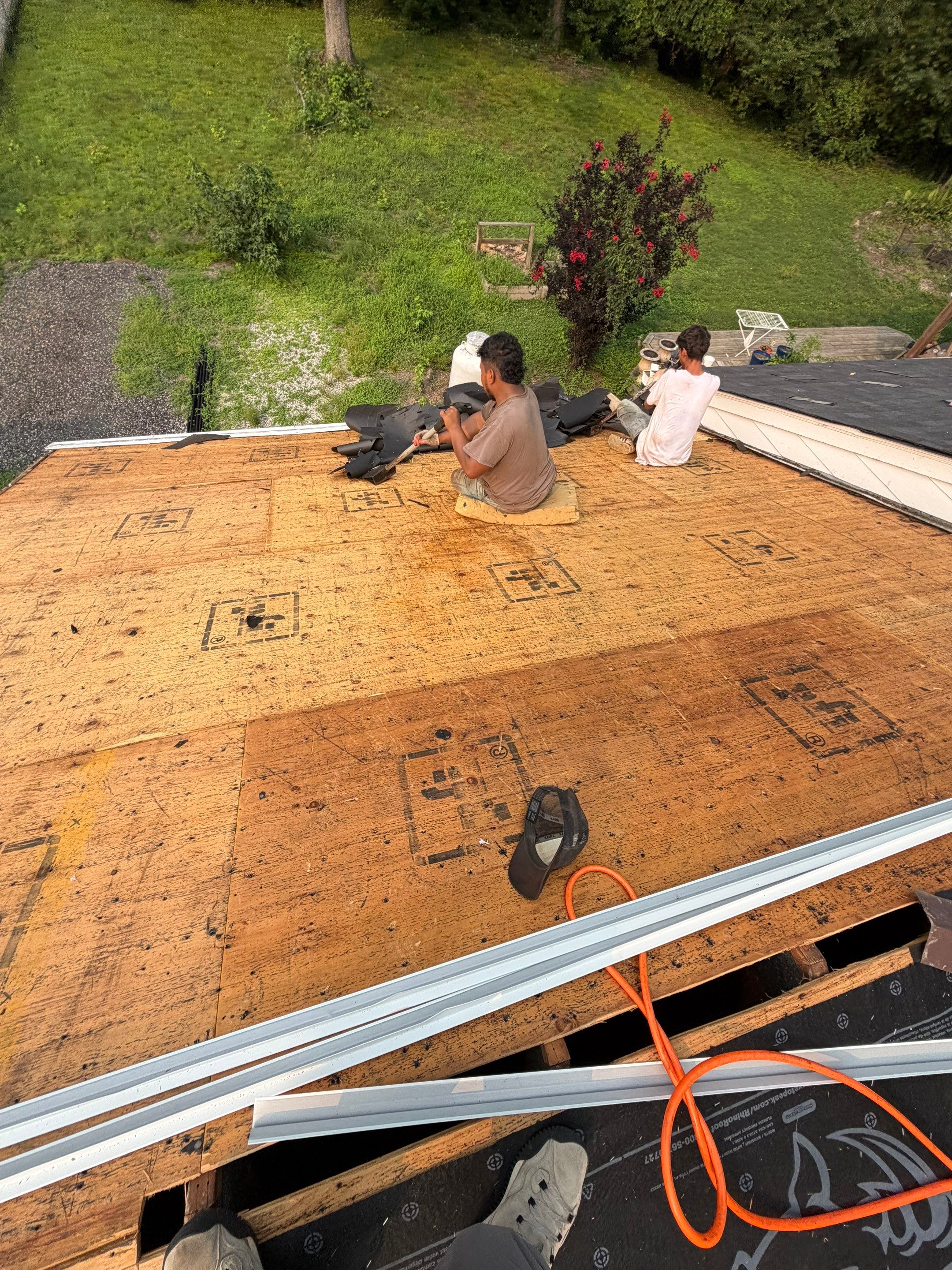 Asphalt Shingle Roof Replacement and Gutter Installation in Richmond by Cade Construction