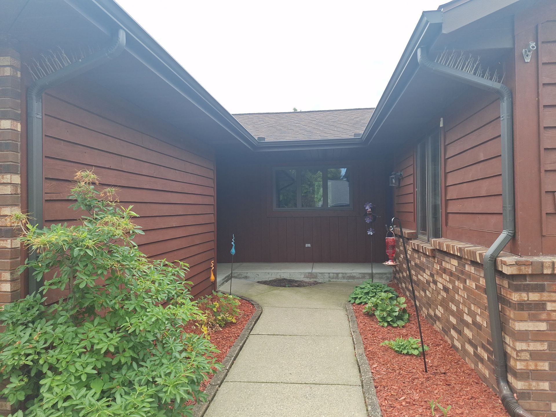 Front of home and garage staining by Gordon Painting