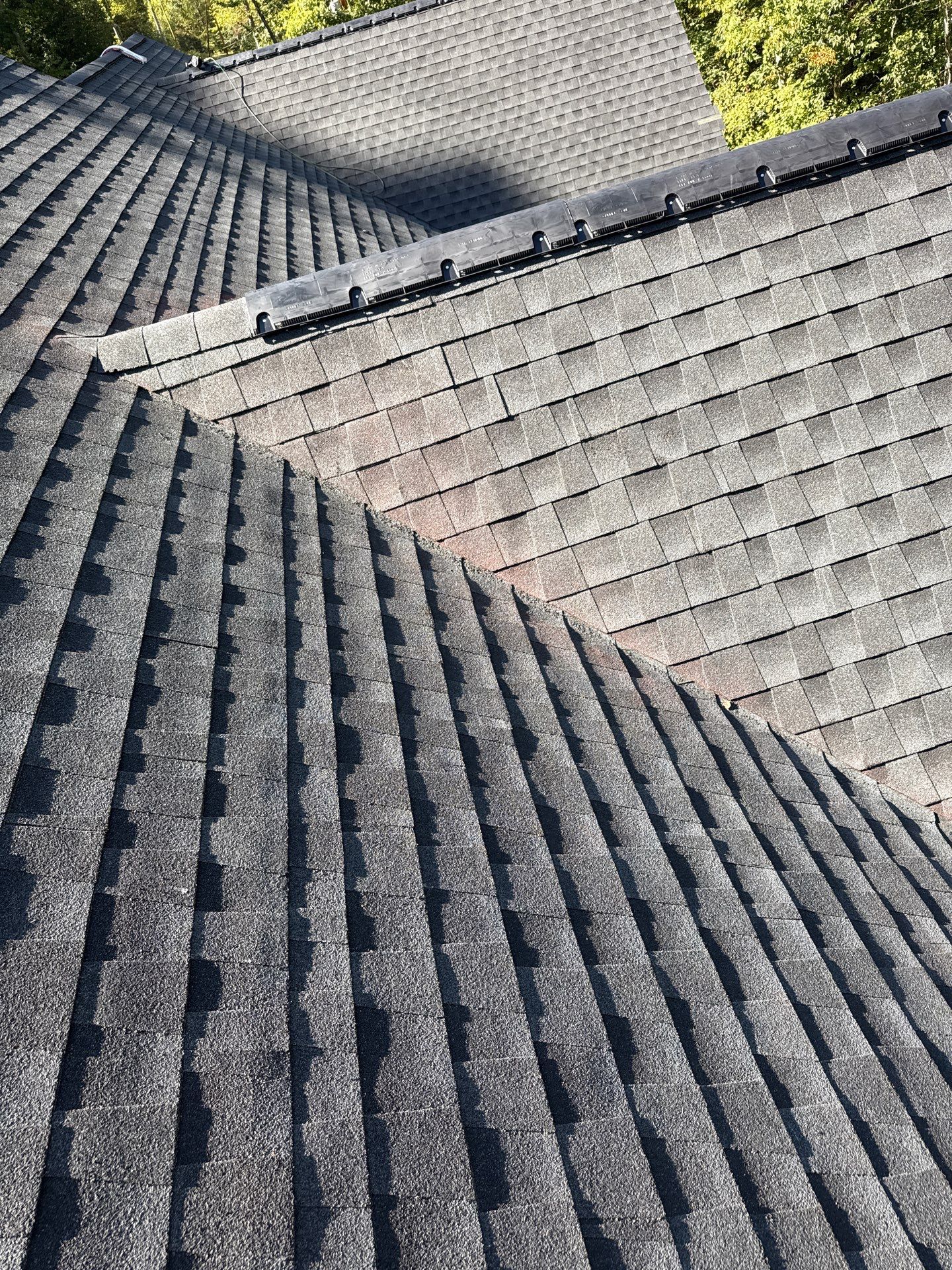 Residential Roofing Installation using GAF Timberline HDZ Charcoal by Rainstoppers Roofing