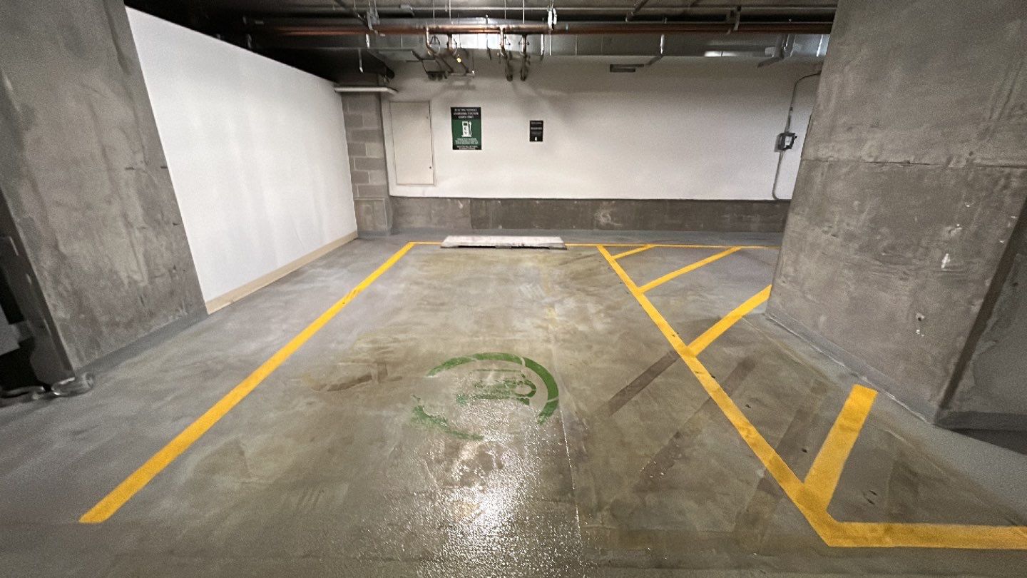 Parking garage using Hot water by Northern Power Washing LLC.