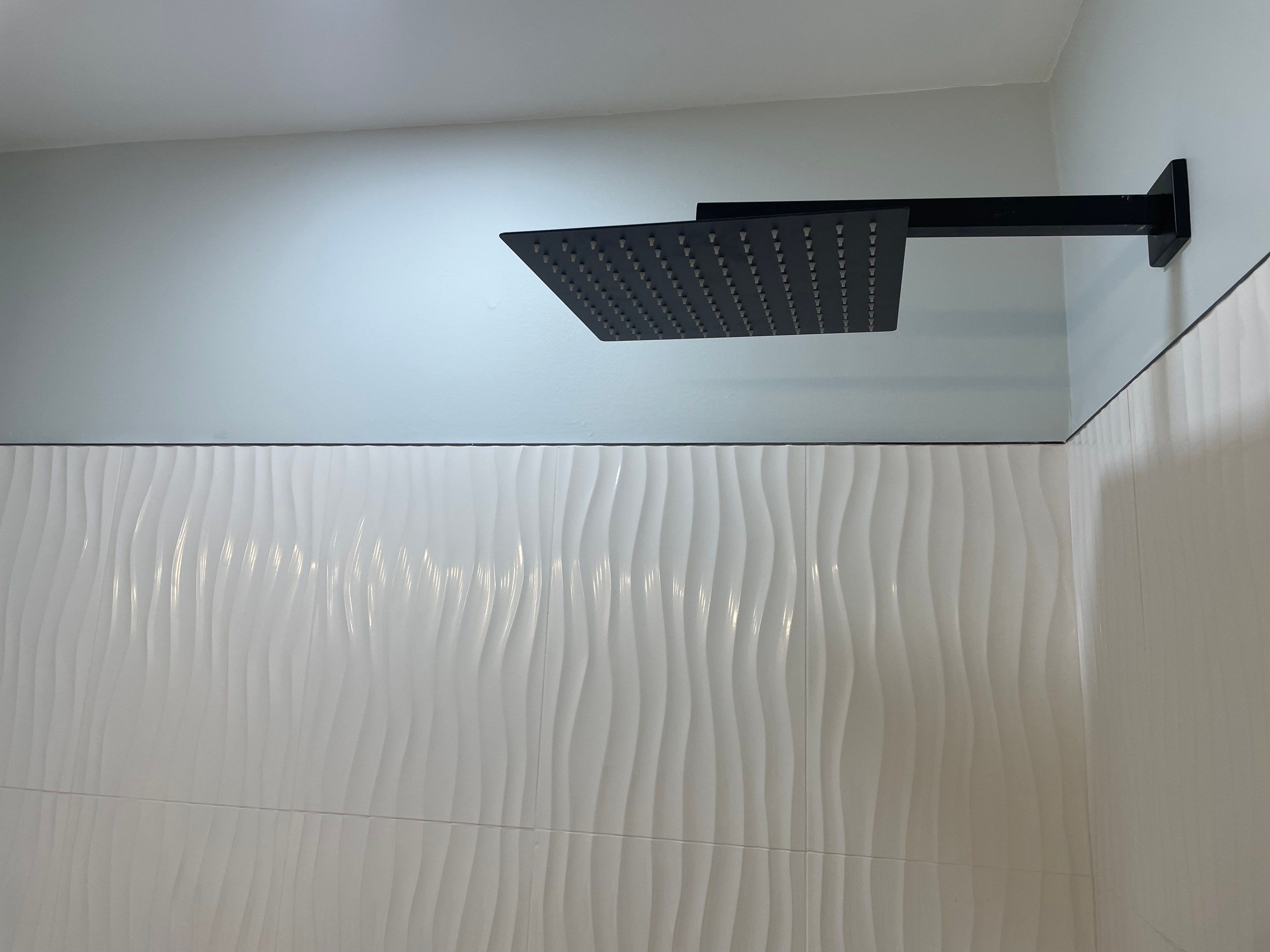 Bathroom Remodel using Tile by Home Concepts Construction