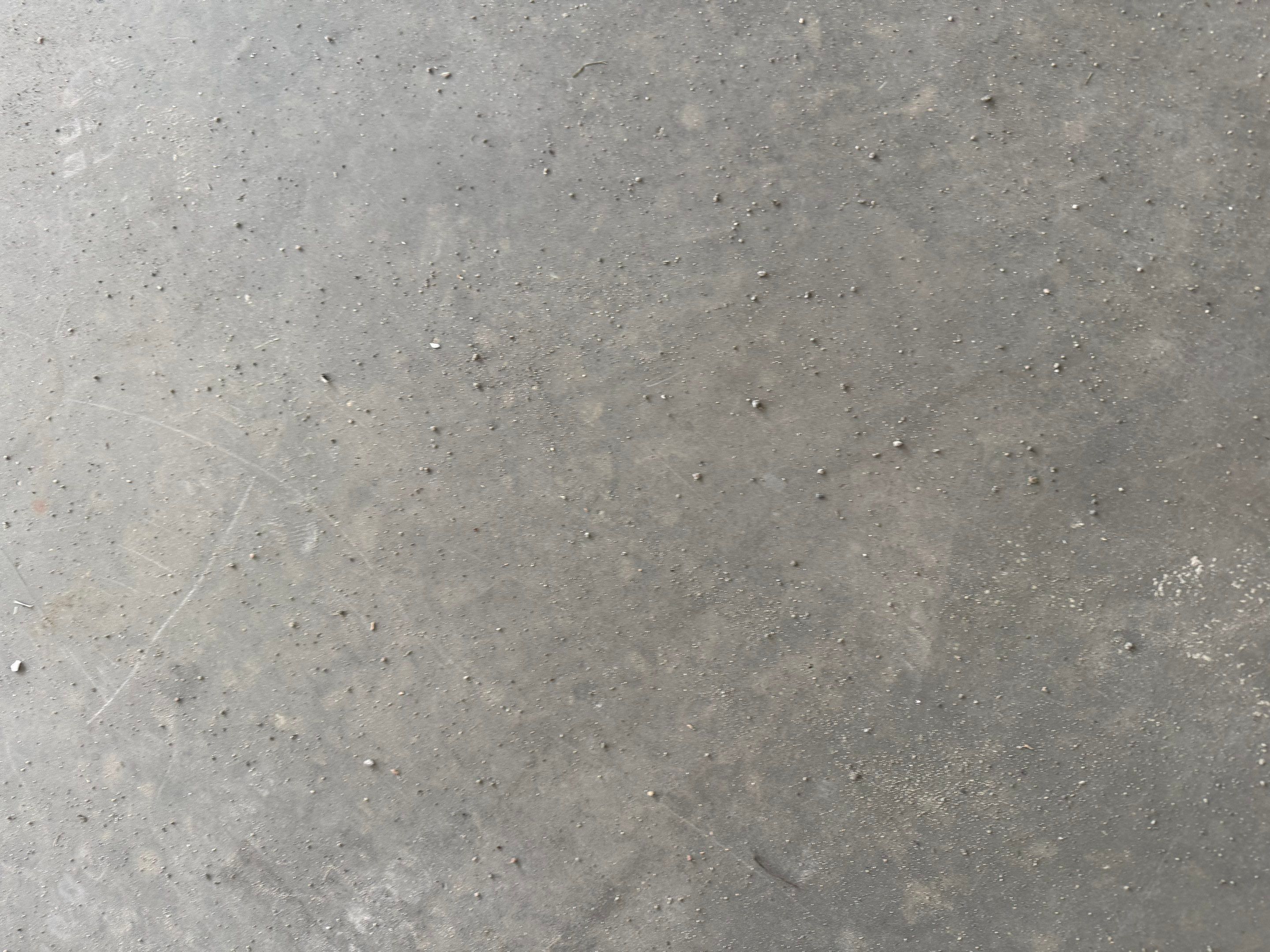 Grey Speckled Epoxy Floor Coating for Sioux Falls Garage by Select Painting, Coatings & Garage Cabinets