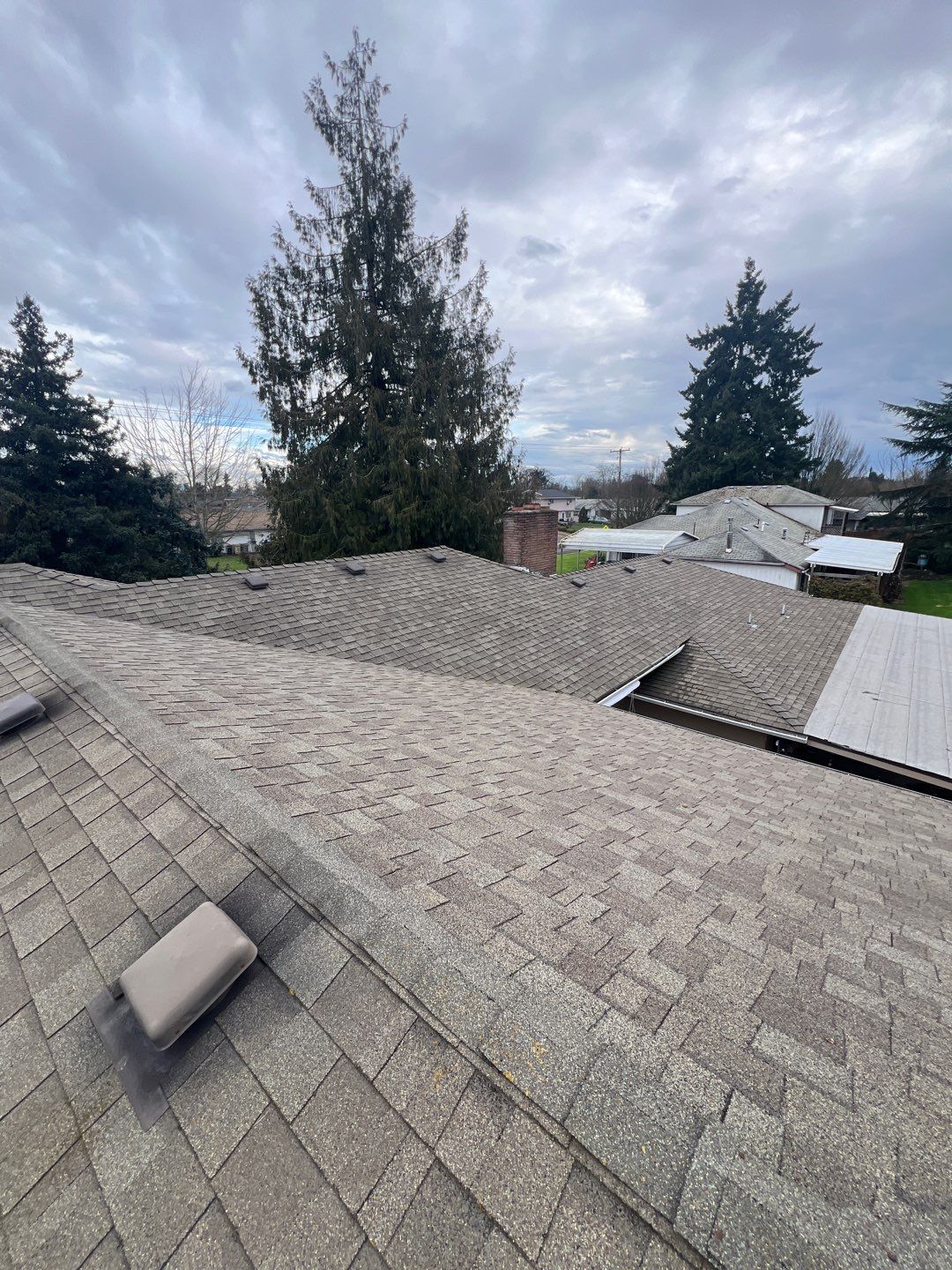 Residential Roofing Installation using IKO Dynasty (Color: Granite Black) by Orezona Building & Roofing Company, Inc.