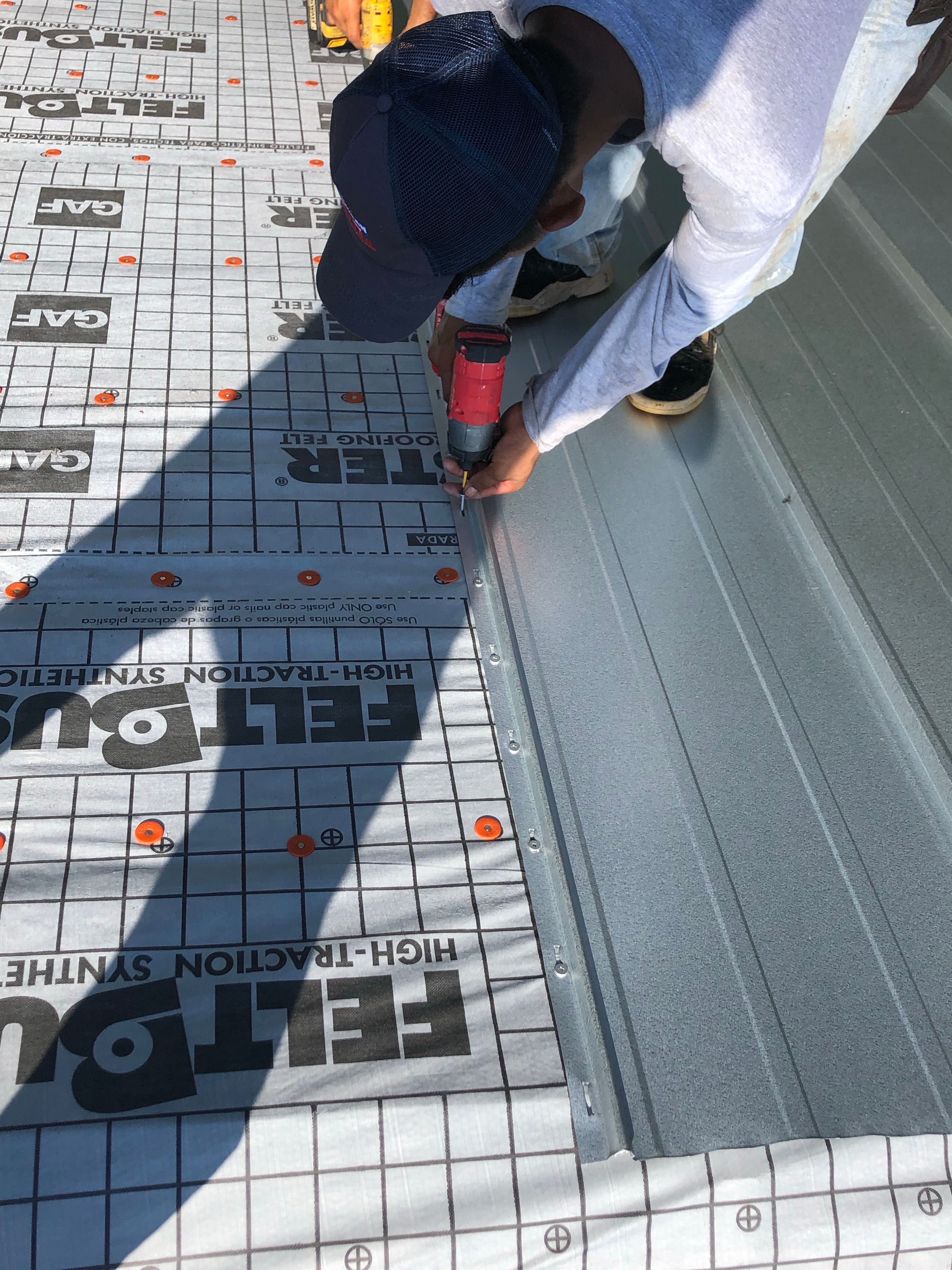 Residential Roofing Installation using Metal roofing by American Roofing & Construction LLC