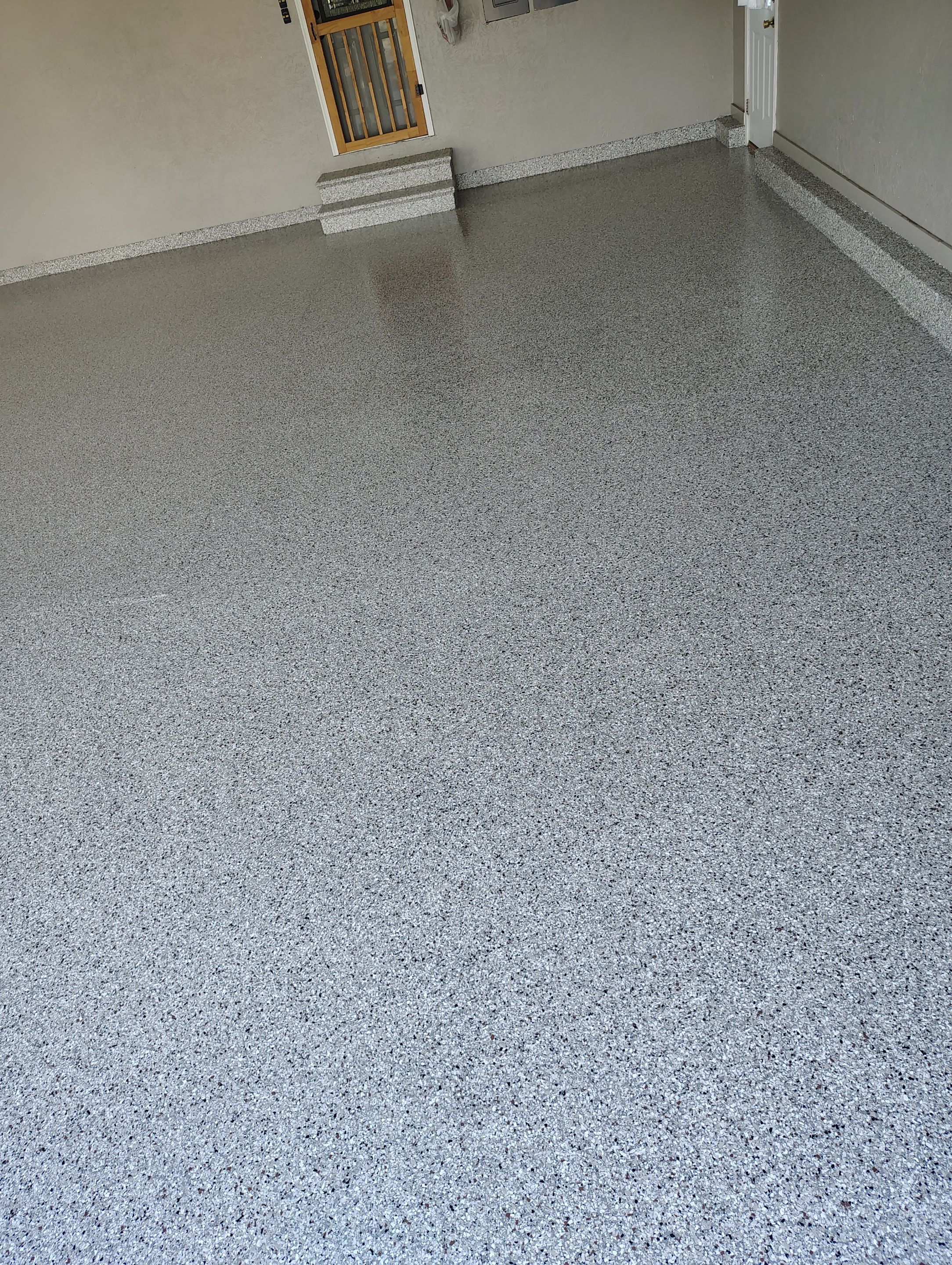 Garage Concrete Floor Coating and Crack Repair in Onawa by Select Painting, Coatings & Garage Cabinets