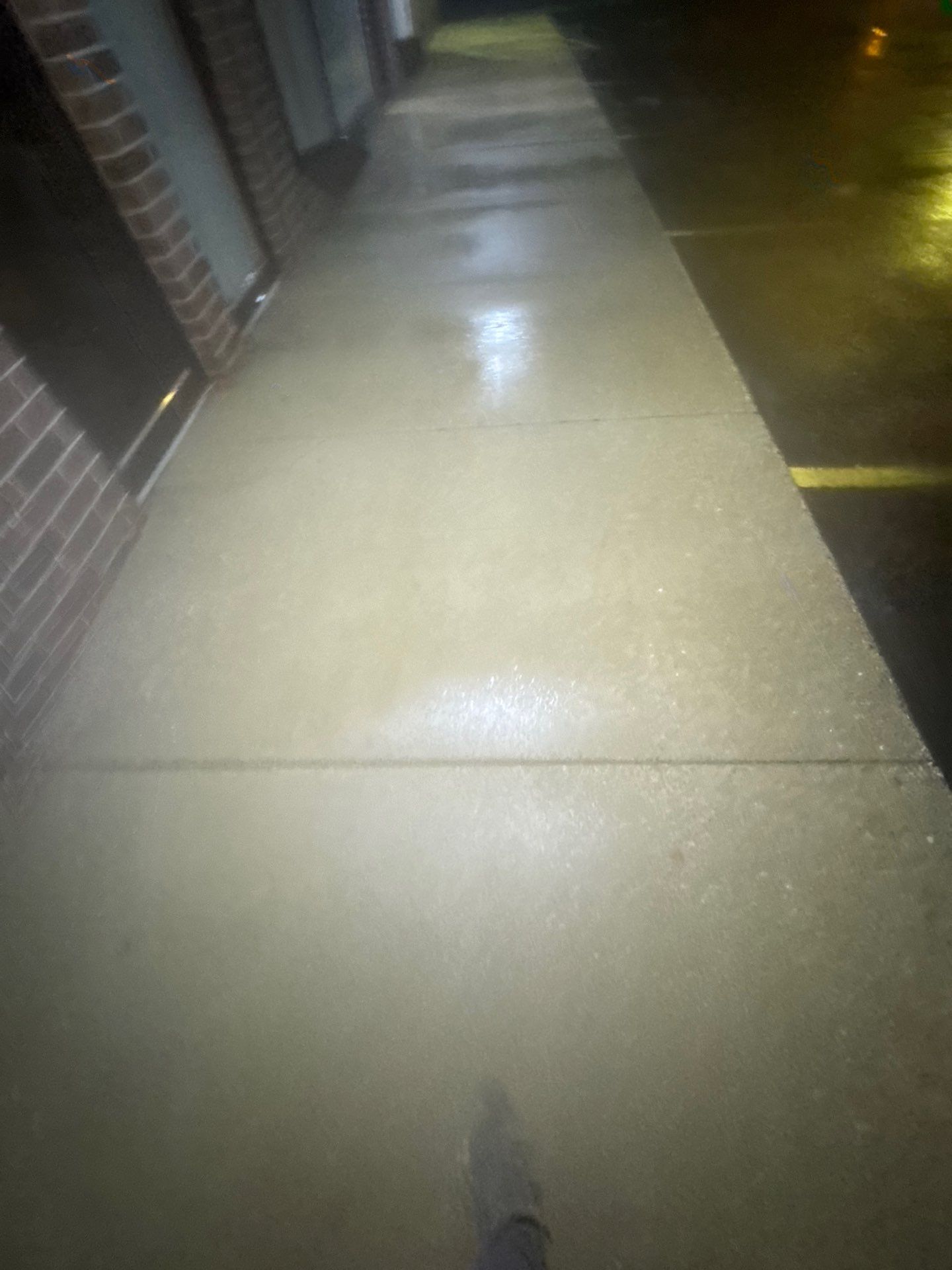 Commercial sidewalk cleaning. by Northern Power Washing LLC.