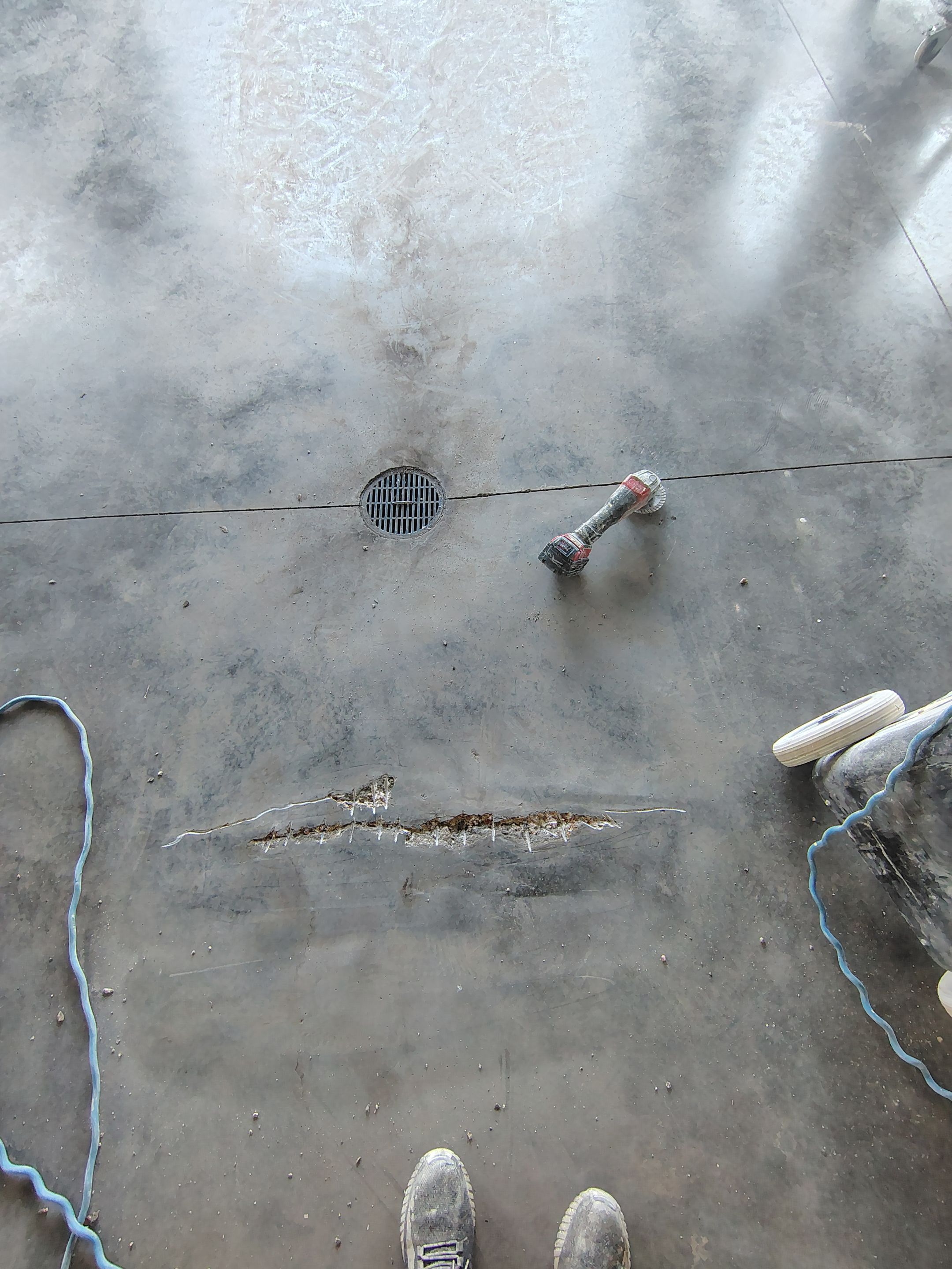 Multi-Car Garage Concrete Coating and Crack Repair in Dell Rapids by Select Painting, Coatings & Garage Cabinets