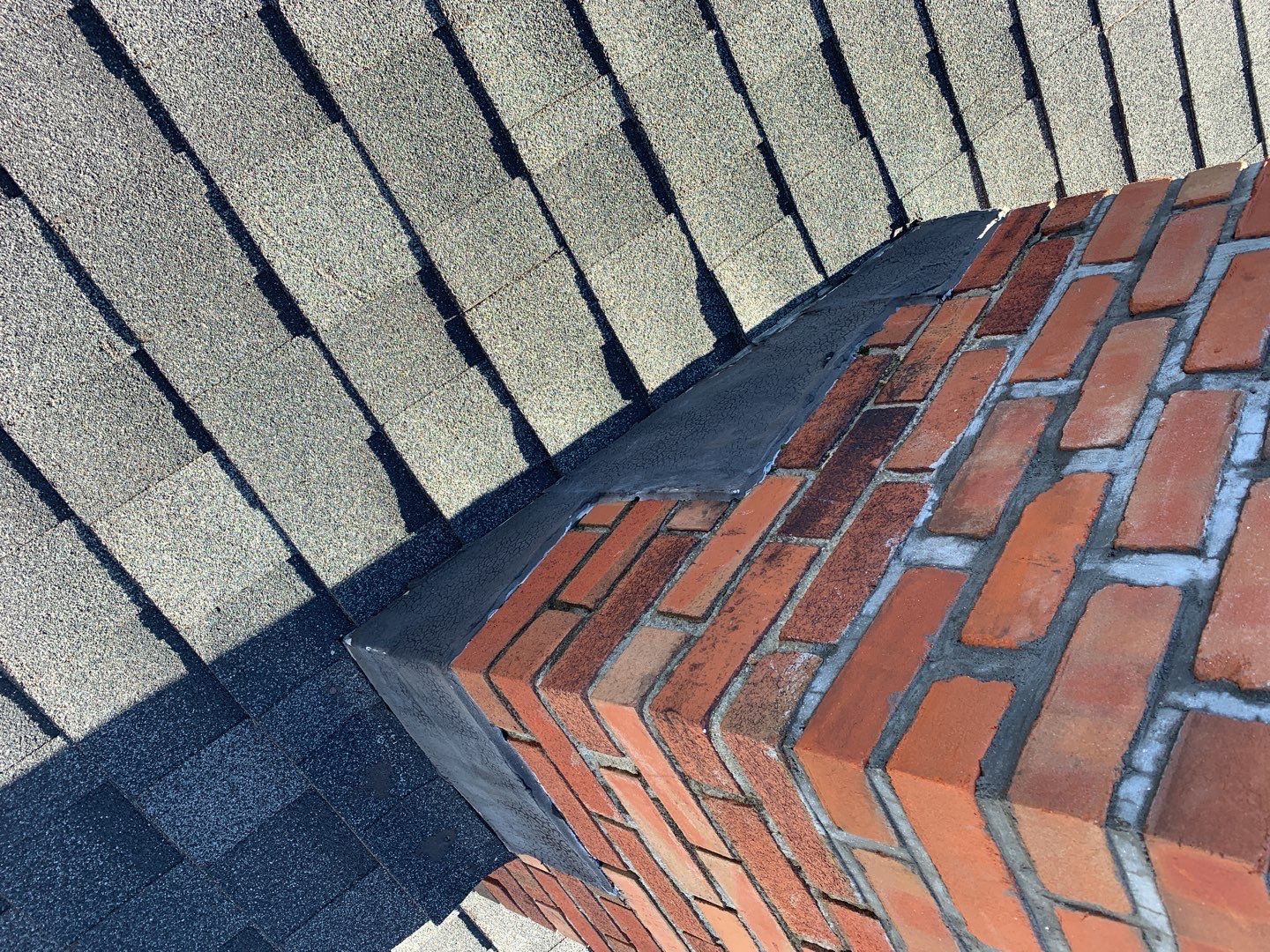 Residential Roofing Repair using Chimney Flashing by A Plus Exterior