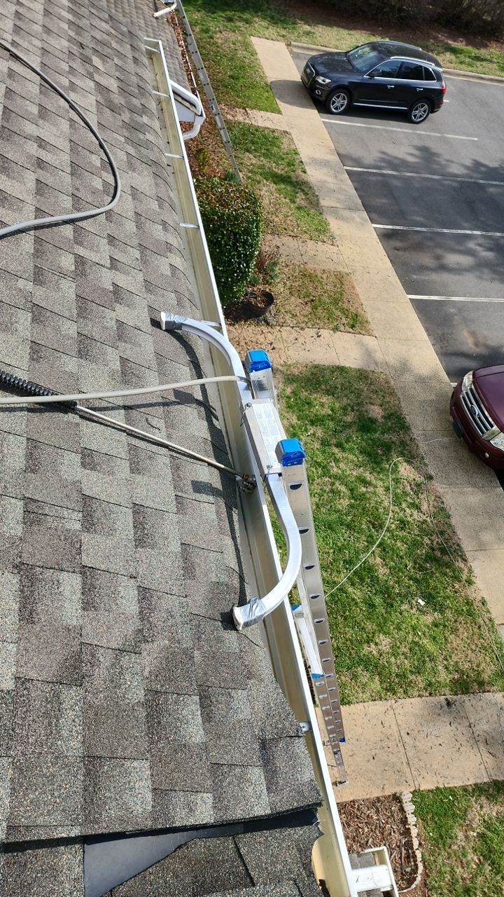 Gutter Cleaning using water by Power Wash Masters LLC