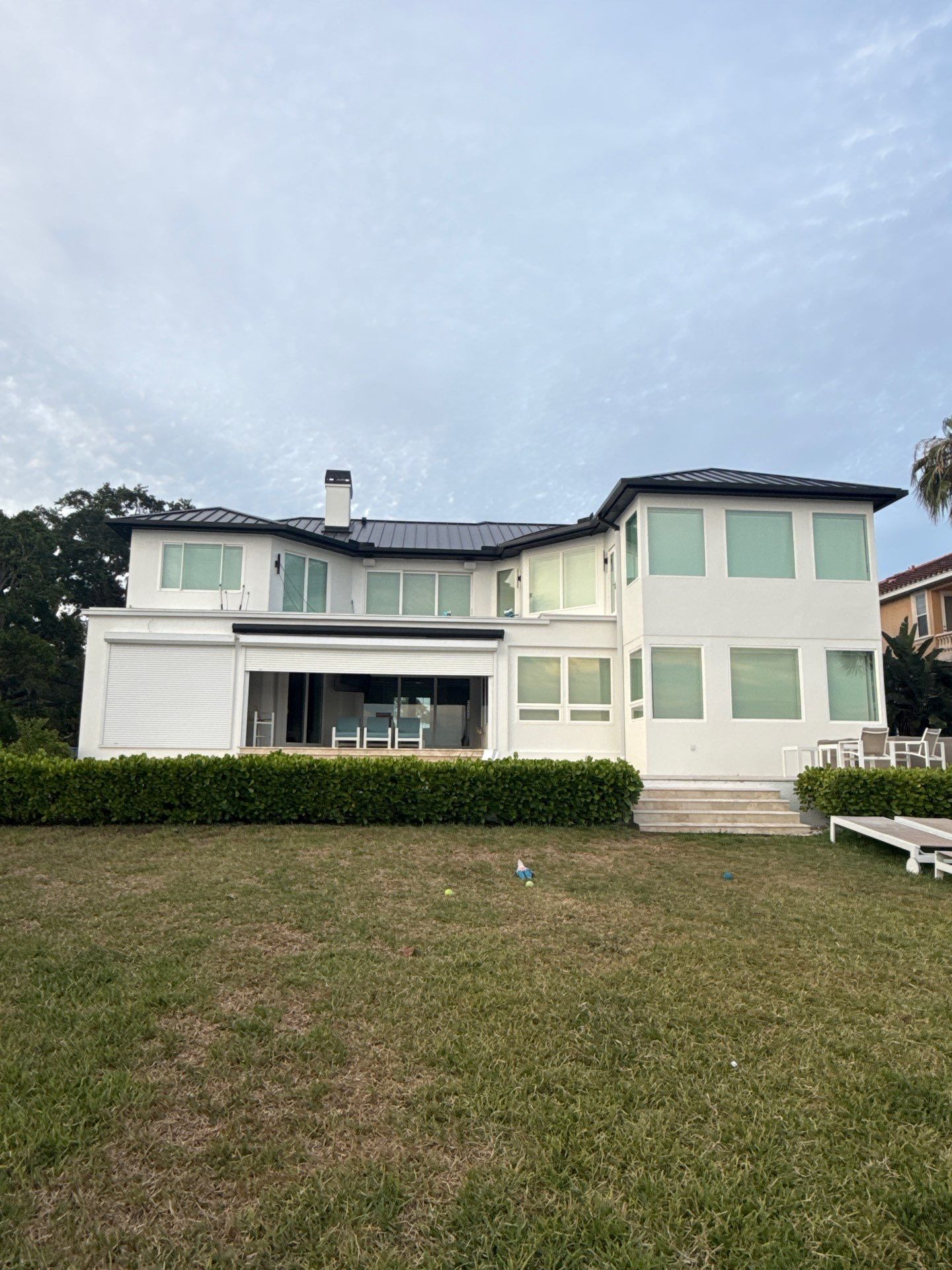 Soffit and Fascia Installation and black seamless gutters in Sarasota FL by Gutter Professors