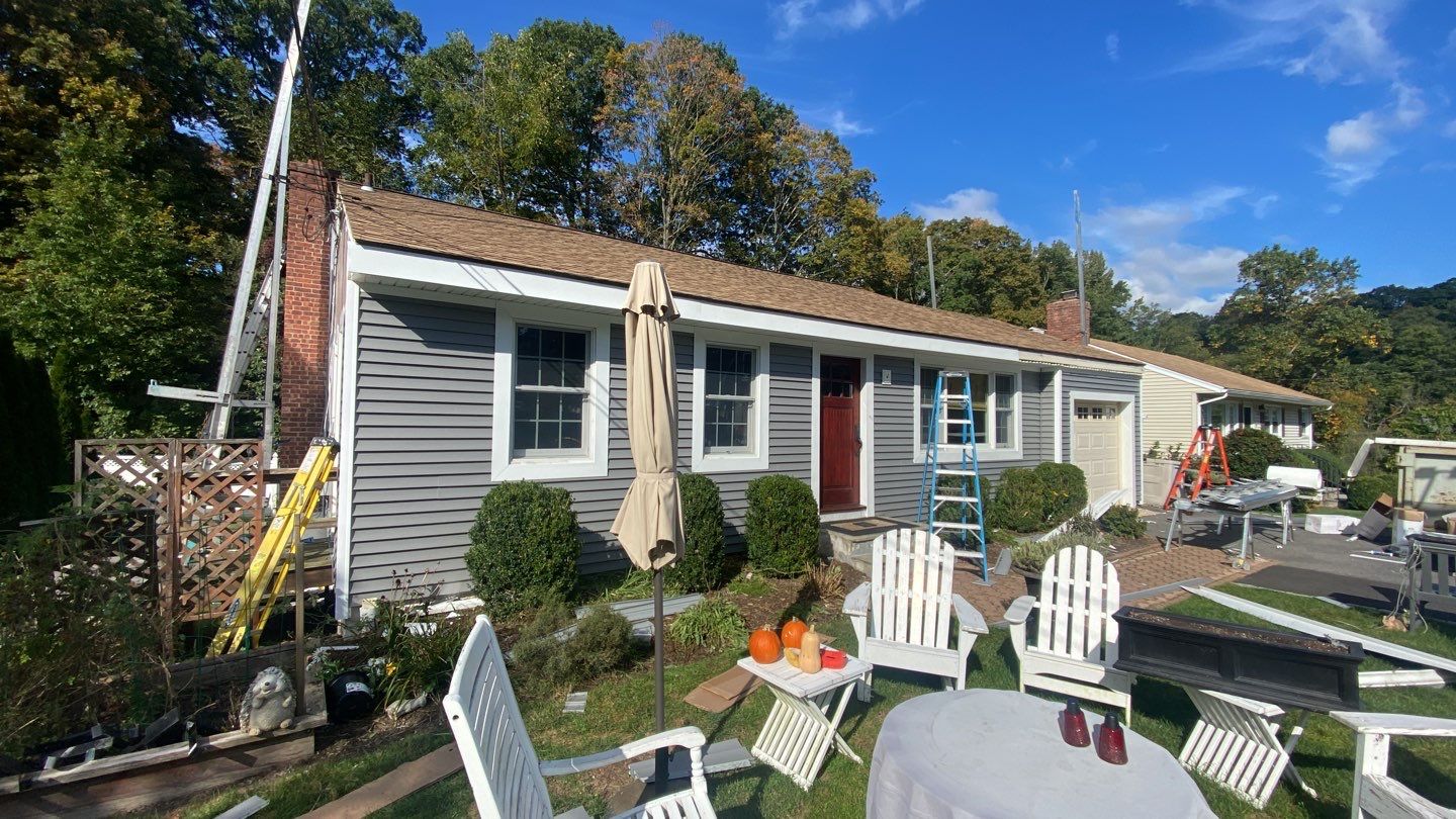 Siding Installation using CertainTeed monogram 4" double 4 Charcoal Gray by A Plus Exterior