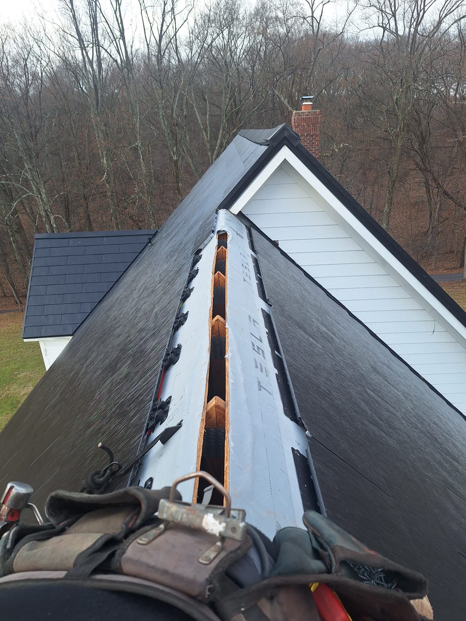 Tesla Solar Roof  using Tesla Powerwall by American Home Contractors