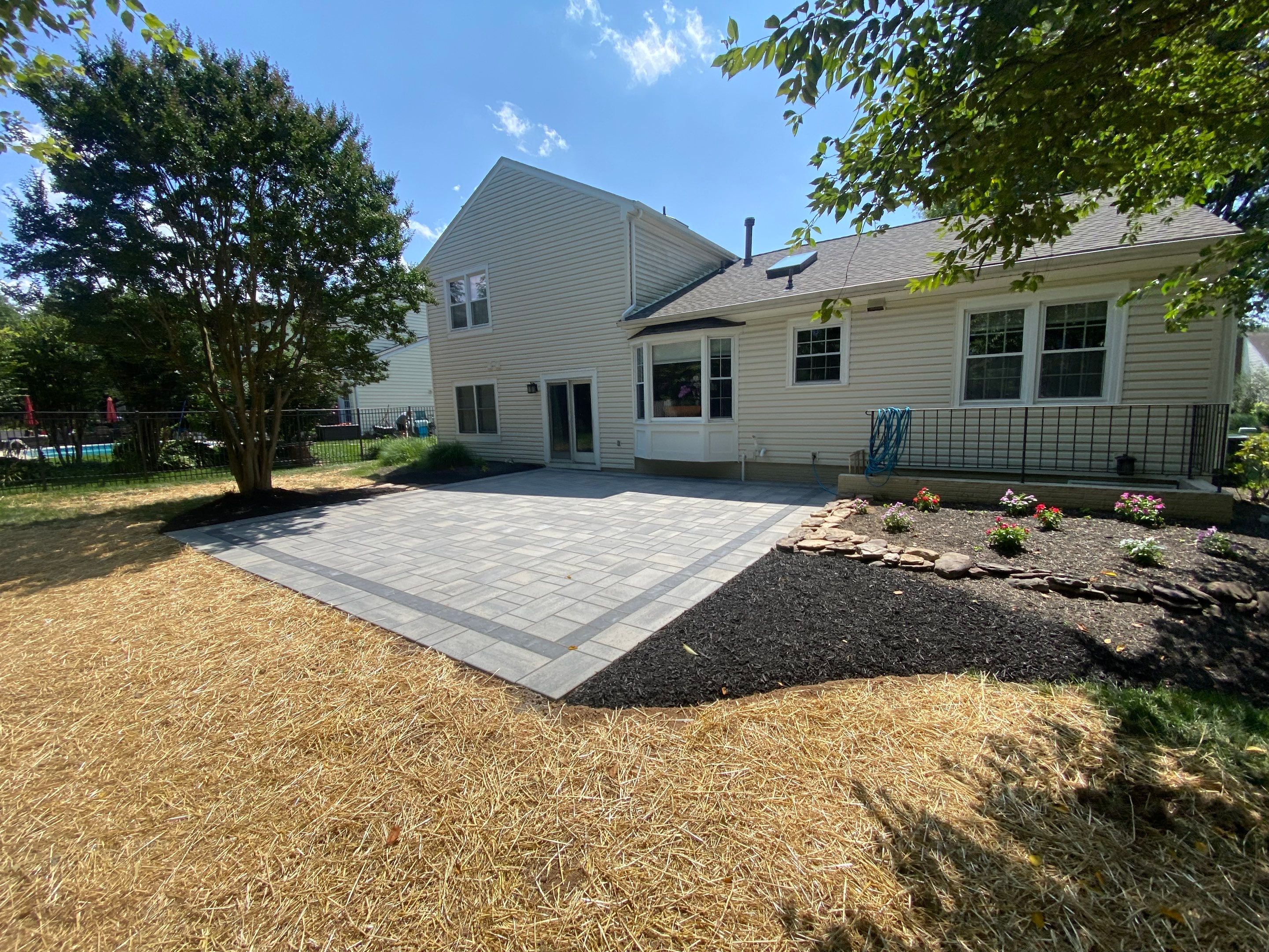 Backyard Transformation using Techo-Bloc Pavers by The Smet Companies, LLC