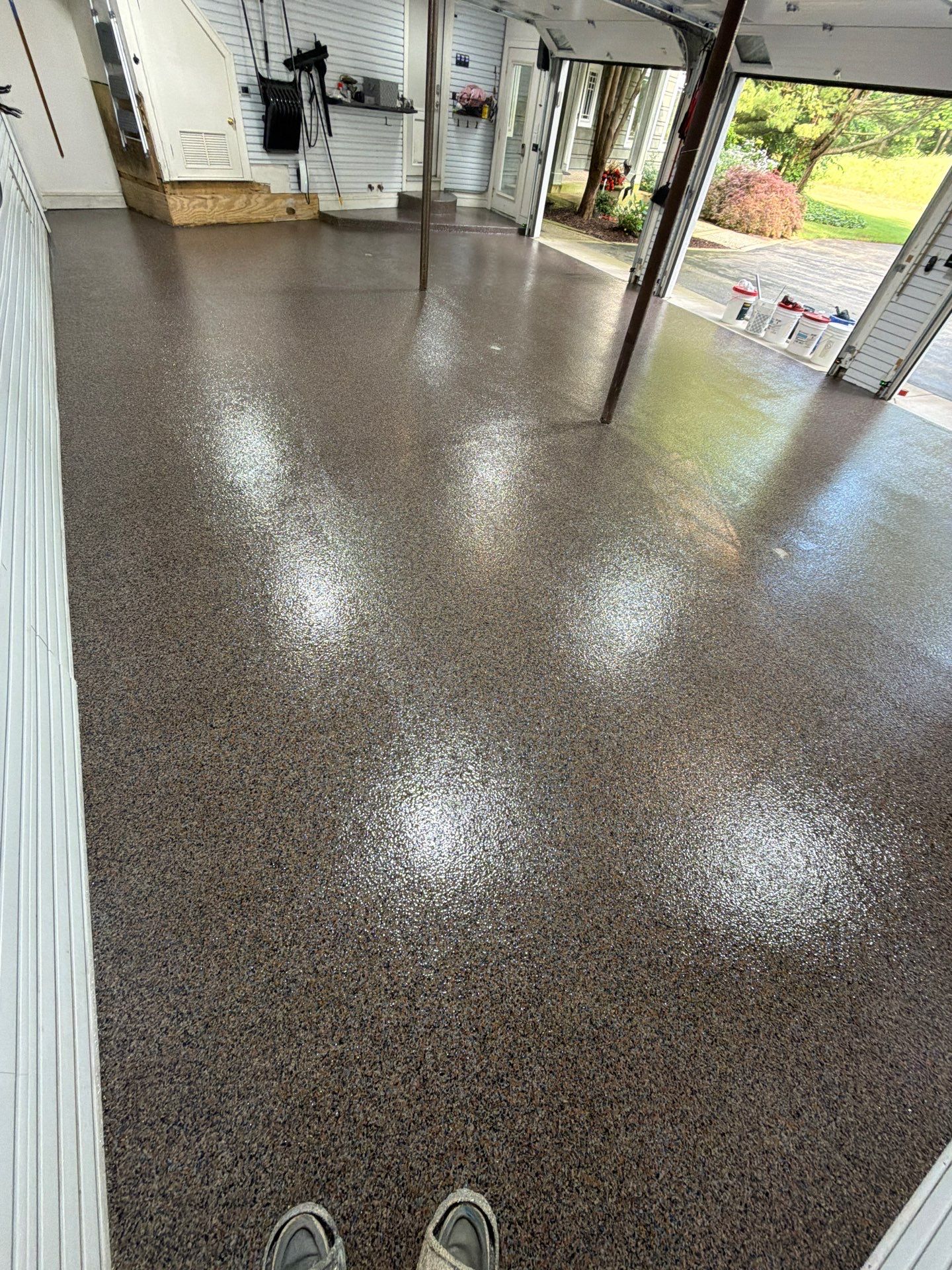 Residential Garage Epoxy Flake Floor Installation in Grand Haven by Gordon Painting