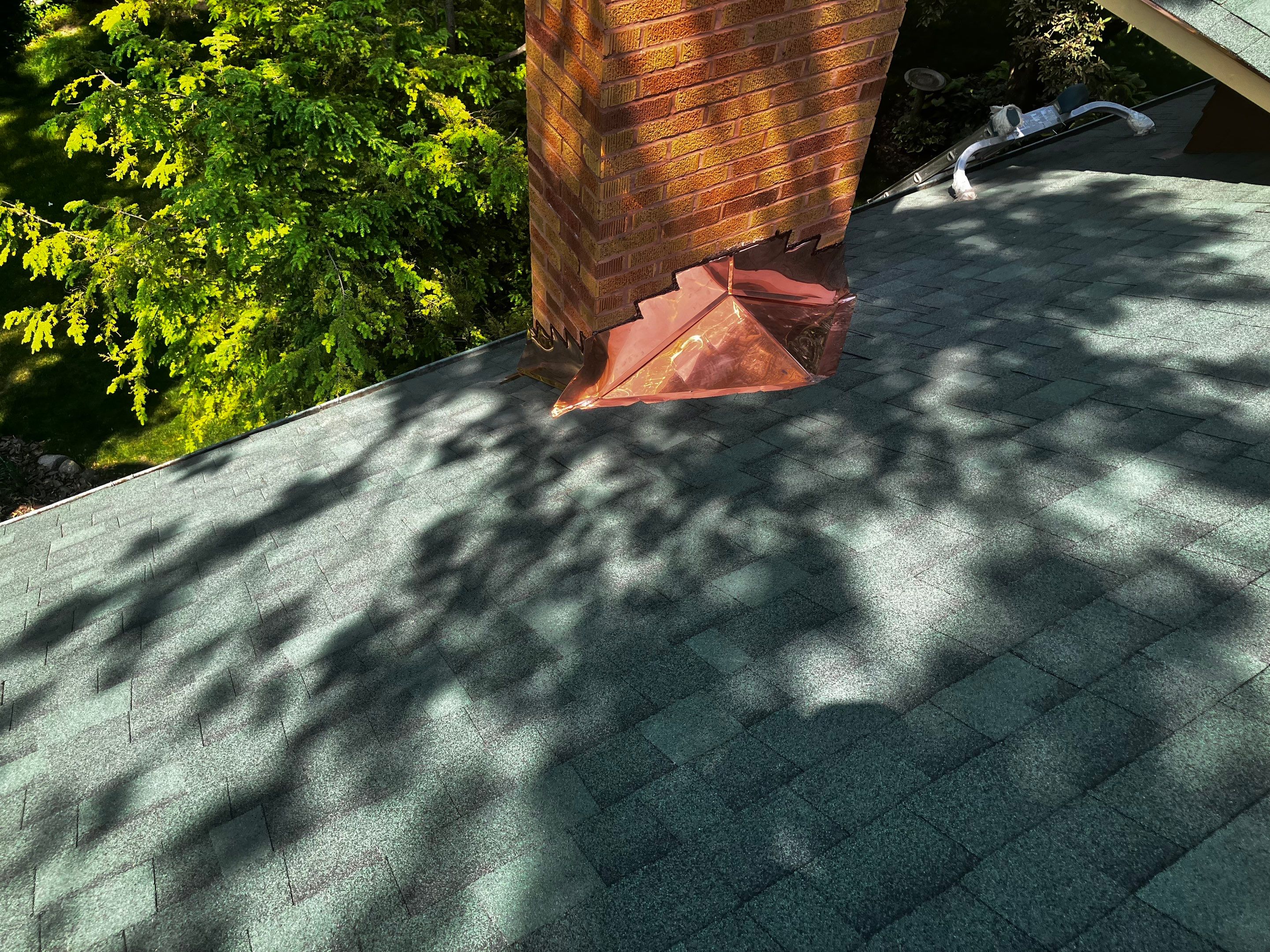Asphalt Shingle Replacement and Half Round Copper Gutters Installation by Custom Installations, Inc.