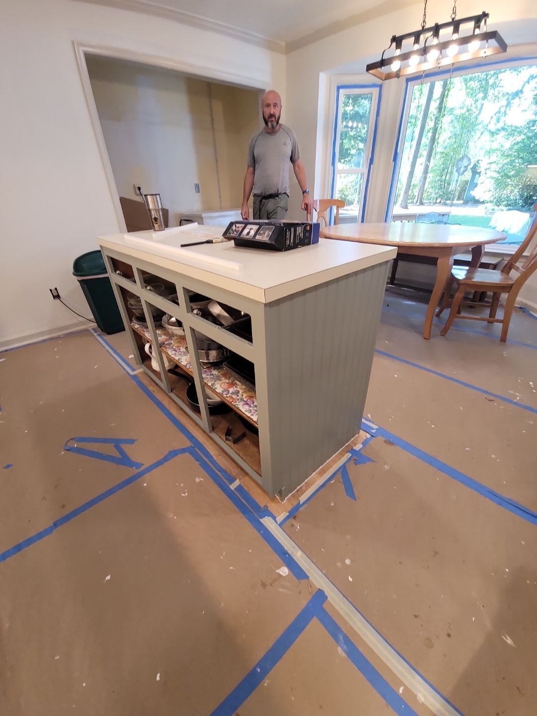 A Pathway to Personality – A Two-Tone Kitchen Transformation in Apex by Elite Remodeling and Design LLC
