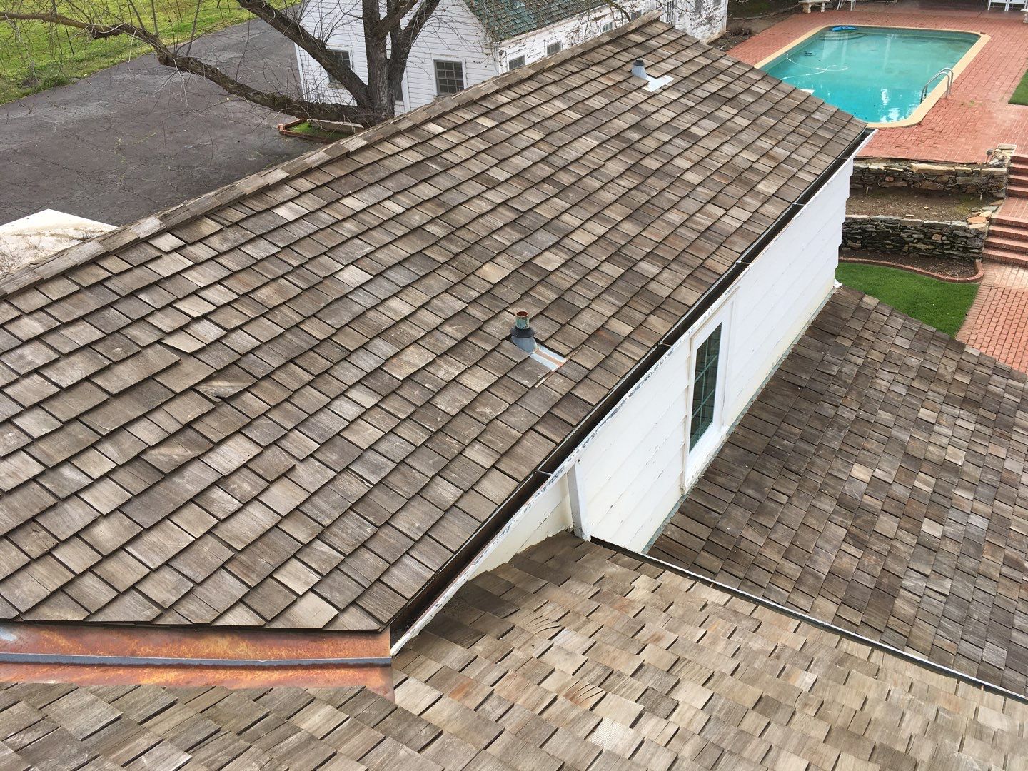 Residential Roofing Installation using Standing seam metal roofing system by Straight Edge Roofing Inc