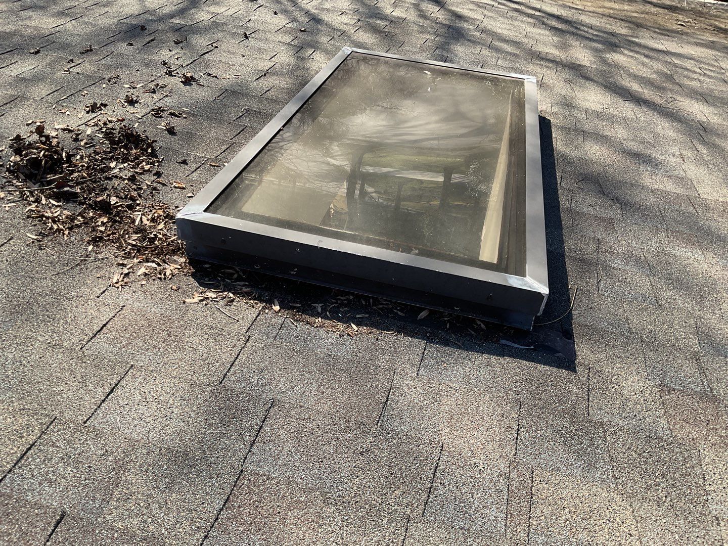 Install new shingles and new skylights  by Alpha Design Services