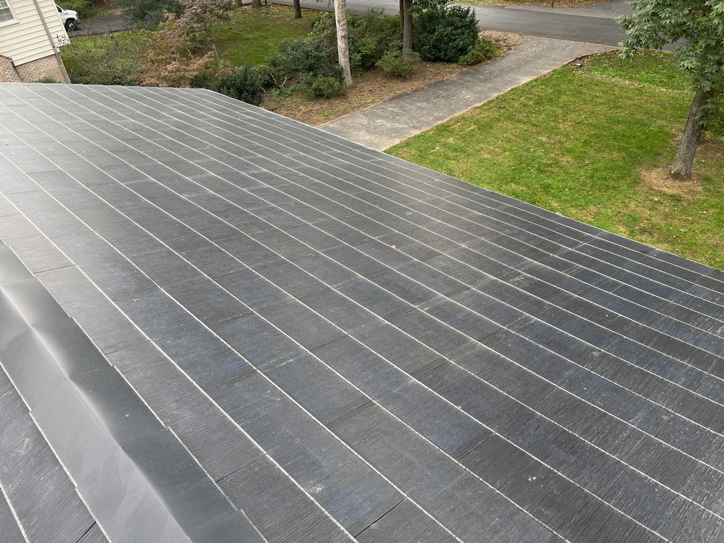 Tesla Solar Roof Replacement using Tesla Solar Roof V3 Tiles by American Home Contractors