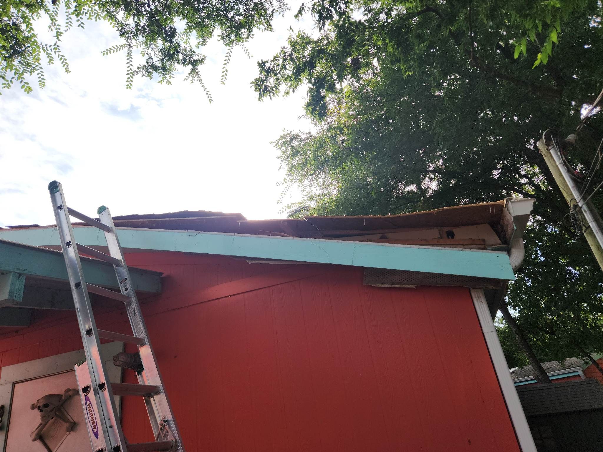 Tree Damage Roof Fascia and Soffit Repair by DeZign Roofing & Exteriors