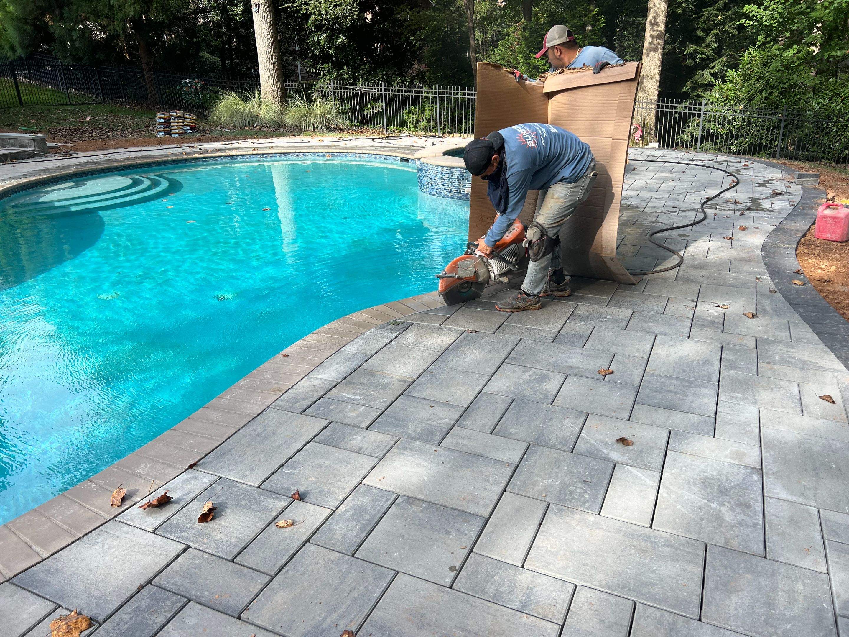 Custom Multi-Level Deck, Outdoor Kitchen & Pool Patio in McLean, VA by Sunburst Construction Inc