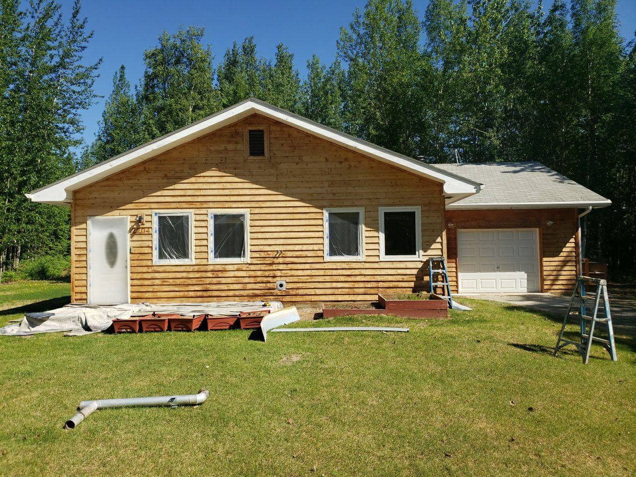 Brightened Cedar Siding & Garage by Midnight Sun Painting