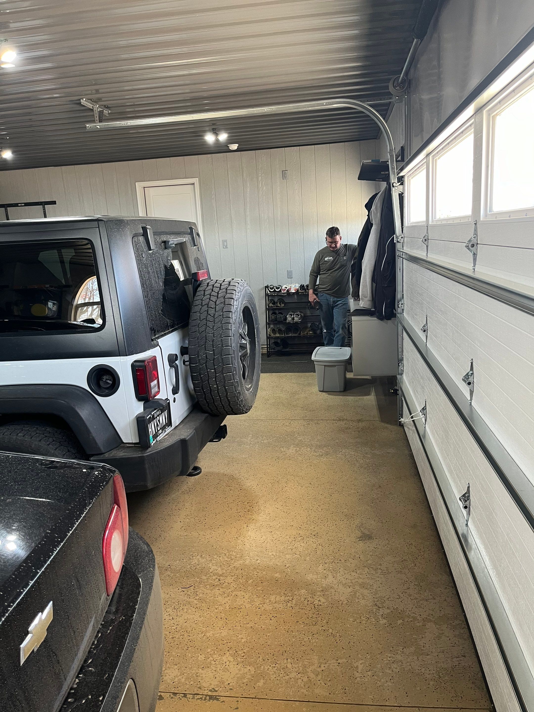 High-Gloss Grey Epoxy Floor Coating for Inwood Garage by Select Painting, Coatings & Garage Cabinets