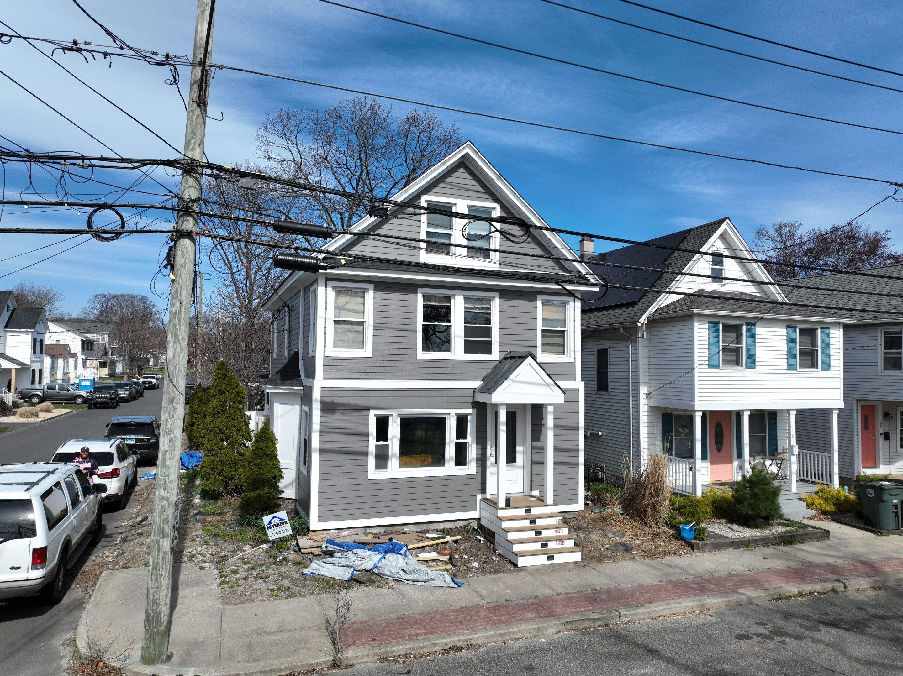Siding Installation using Hardie Plank Aged Pewter by A Plus Exterior