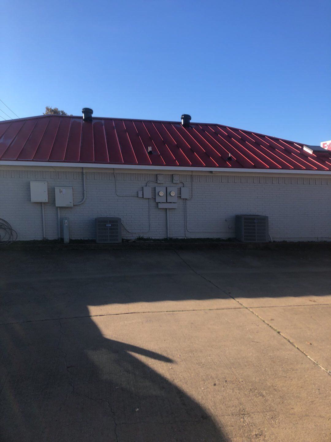 Commercial metal roof by Springtree Restoration 