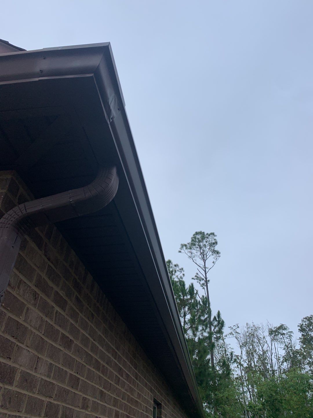 Replace gutter using Royal Brown in Panama City FL by Gutter Professors