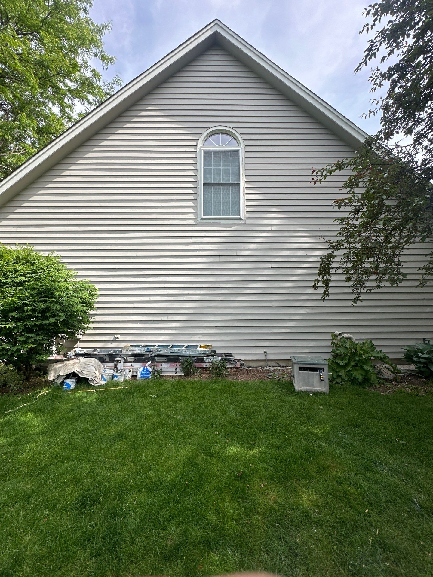 Exterior Home Staining Project in Greenfield Using Sherwin-Williams Amazing Gray by OCS Contracting Services