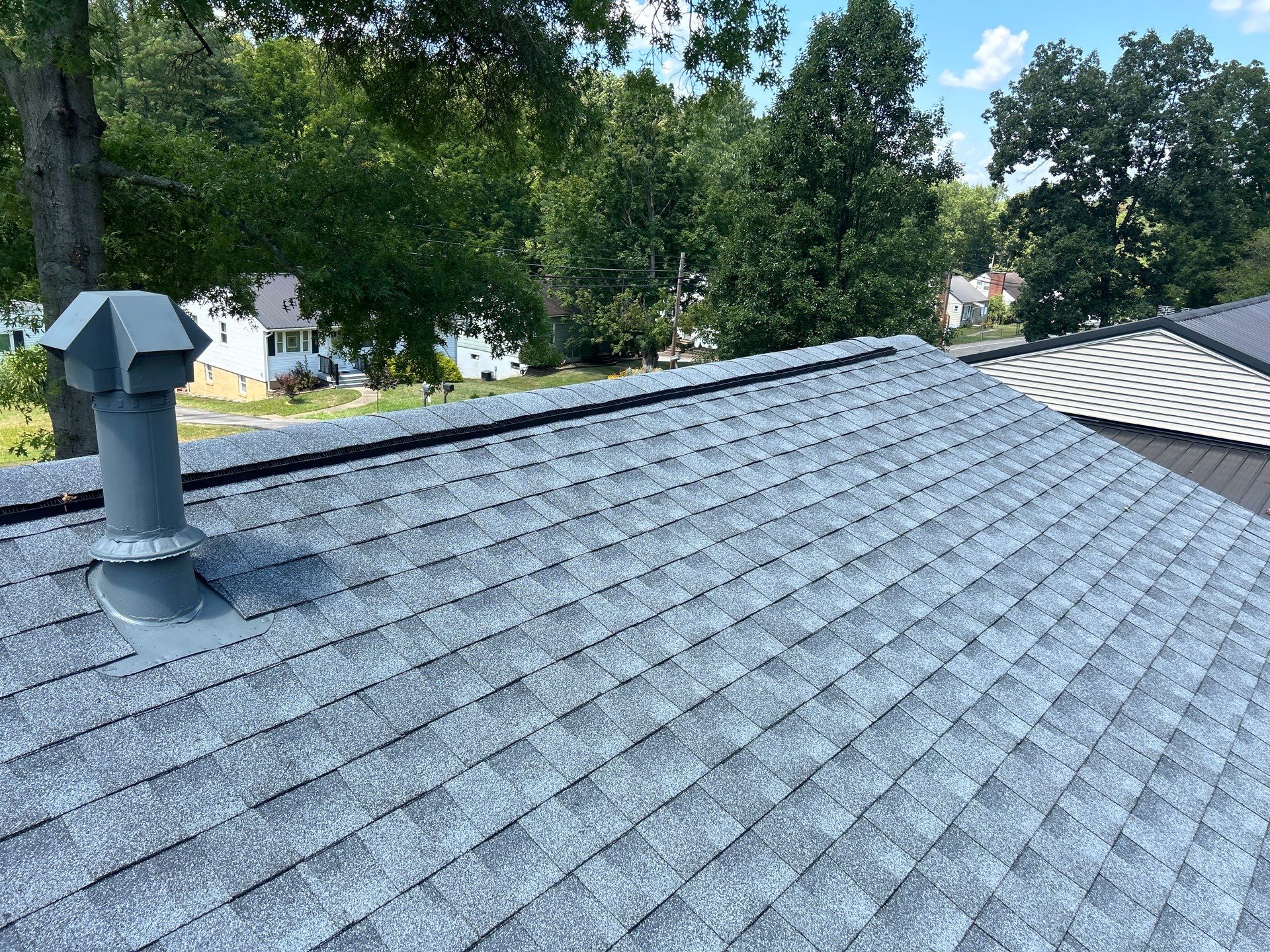 Residential Roofing Installation using GAF Timberline HDZ Oyster Grey by Rainstoppers Roofing