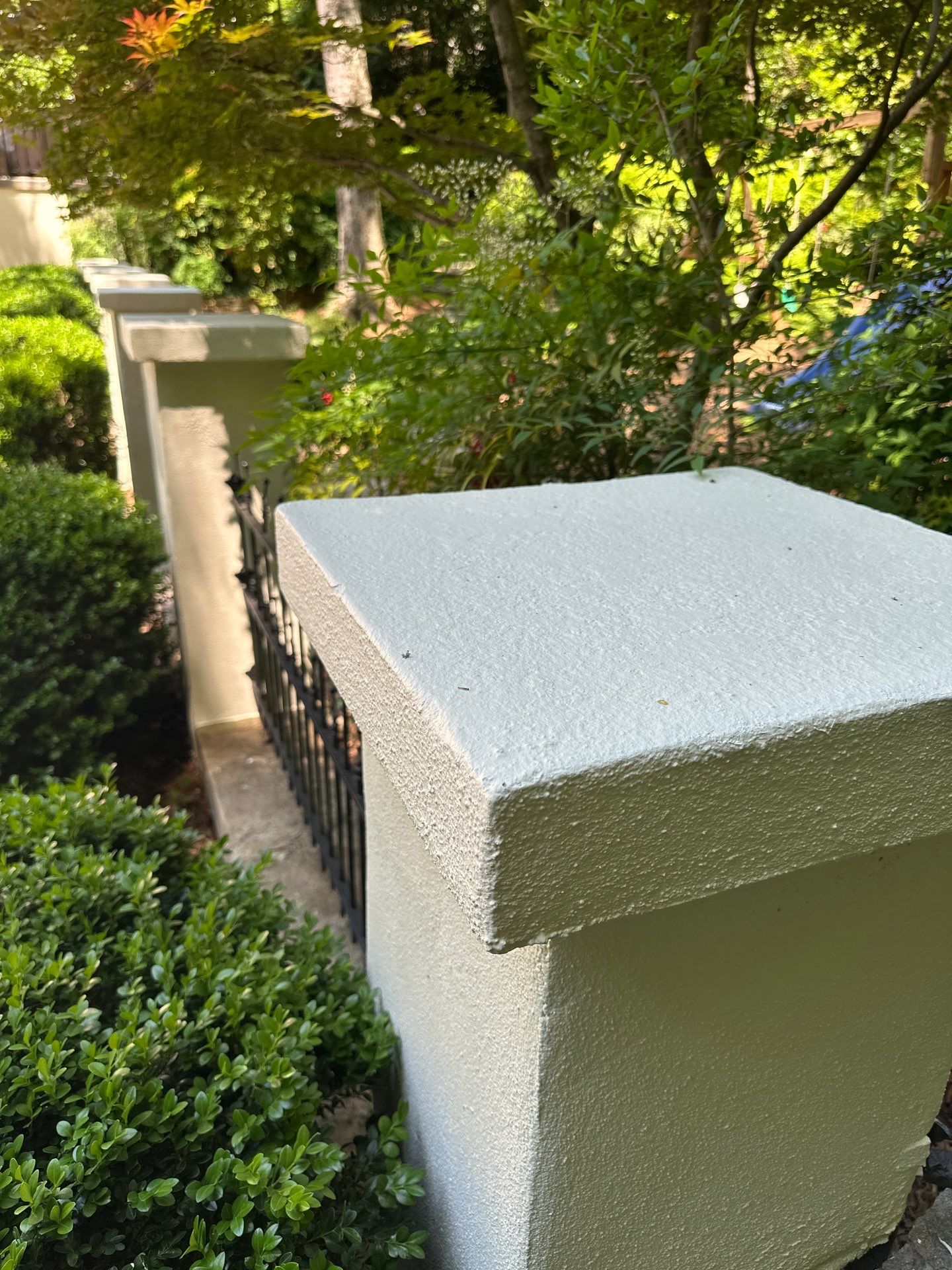 Rear Exterior Upgrade: Railings, Fence, and Stucco Column Restoration by Atlanta's Paint Doctor