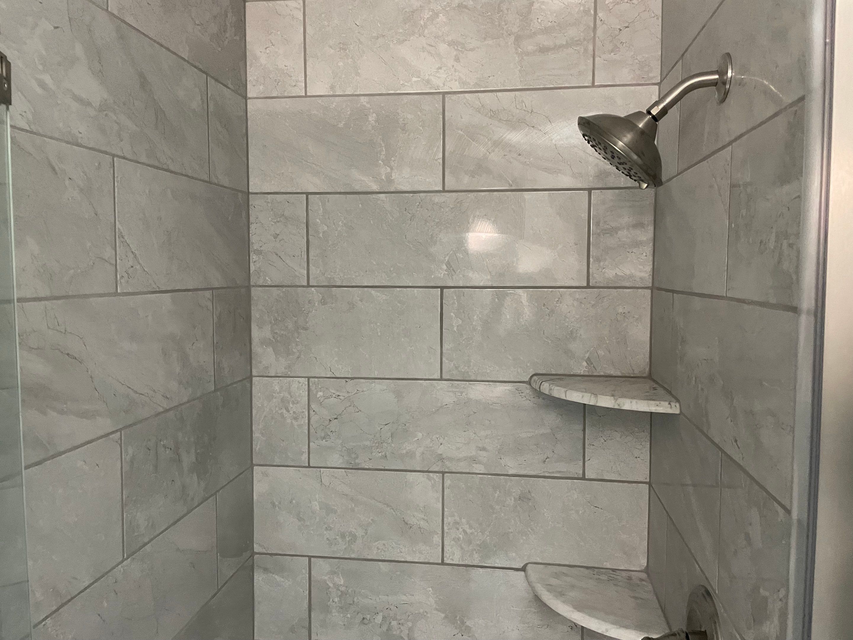 Bathroom Remodel using Tile by Home Concepts Construction