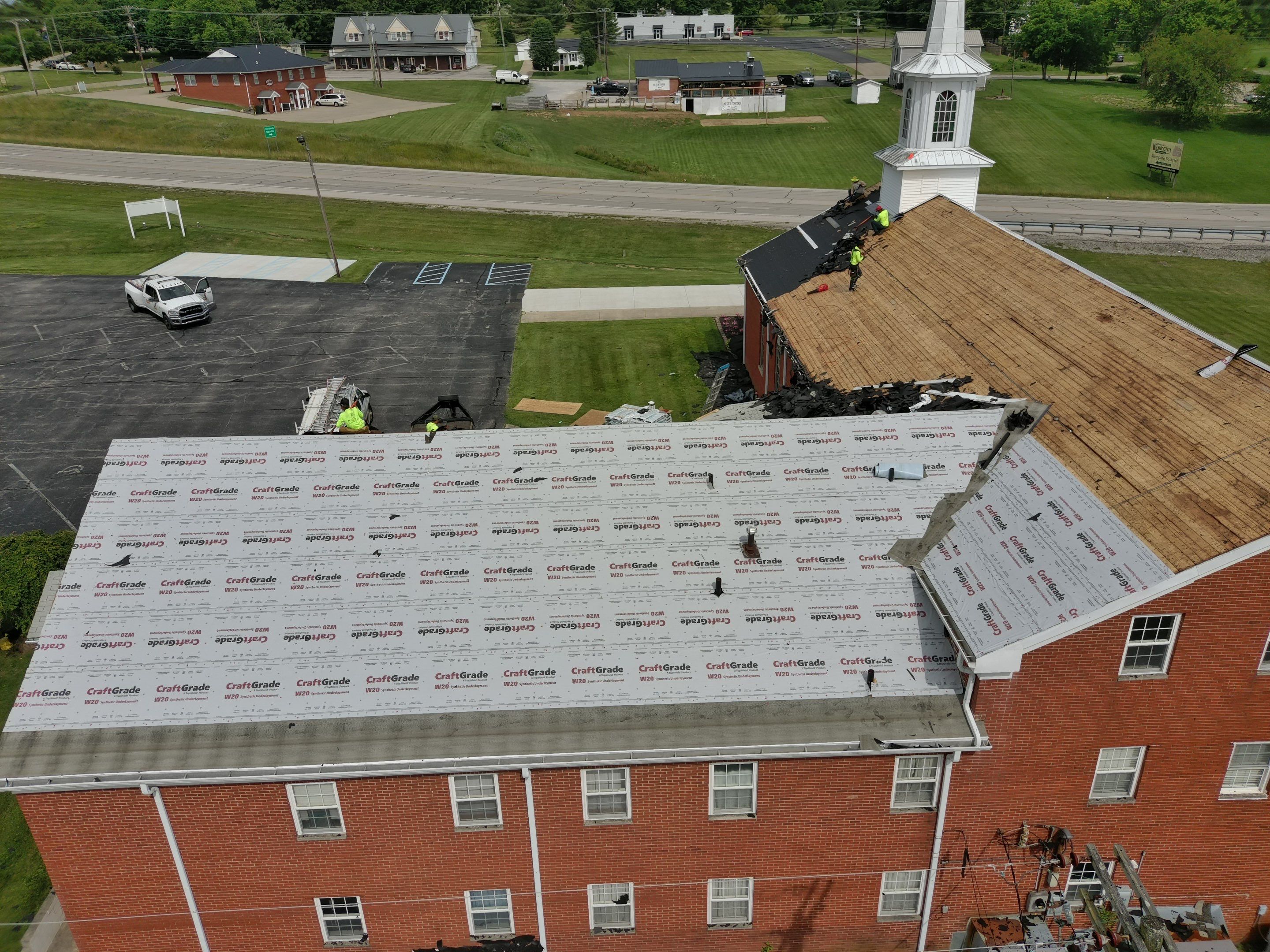 Commercial Roofing Installation using Performance Shingles by Mr. Roofer