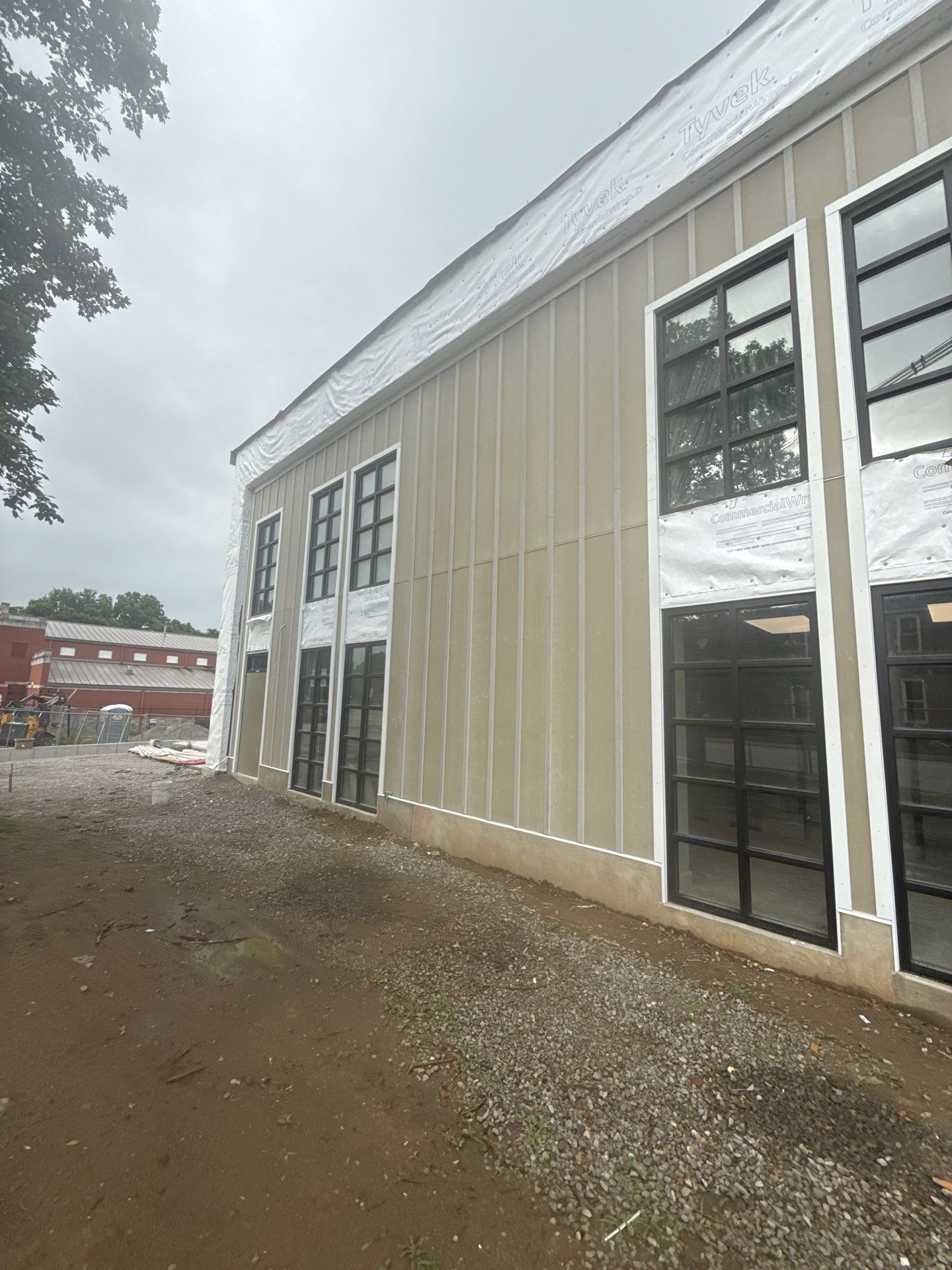 Louisville Commercial Building Siding and Window Installation by GreenForce Restoration