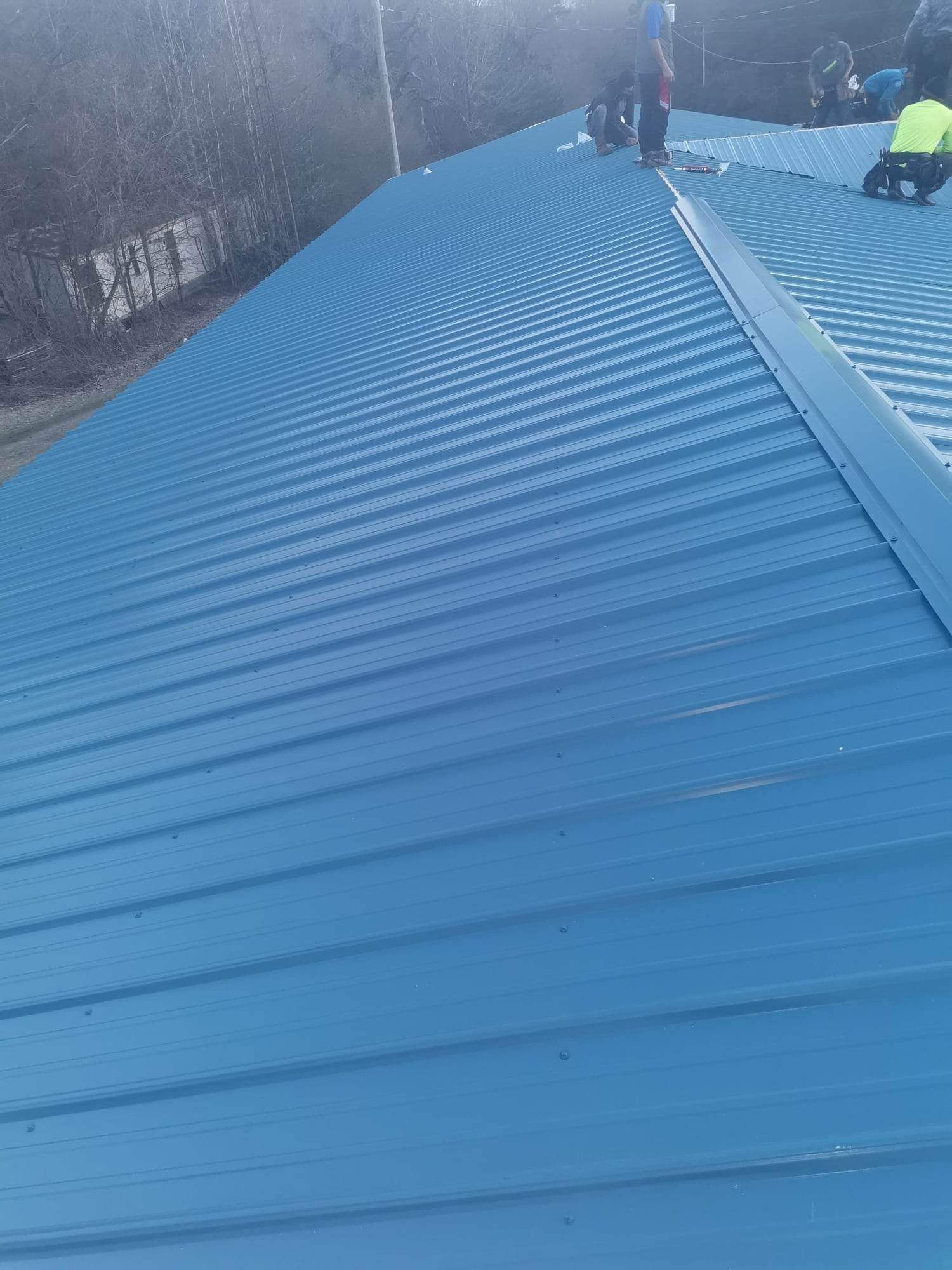 Residential Roofing Installation using 29 gauge metal by Hostetler Roofing