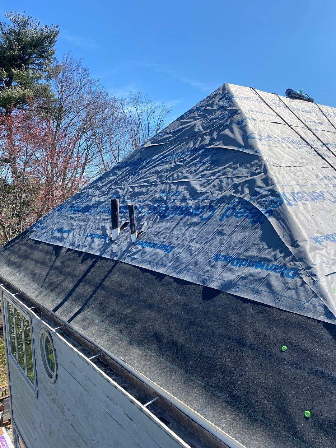 New Roof Installation & New Gutters and downspouts  by Alpha Design Services