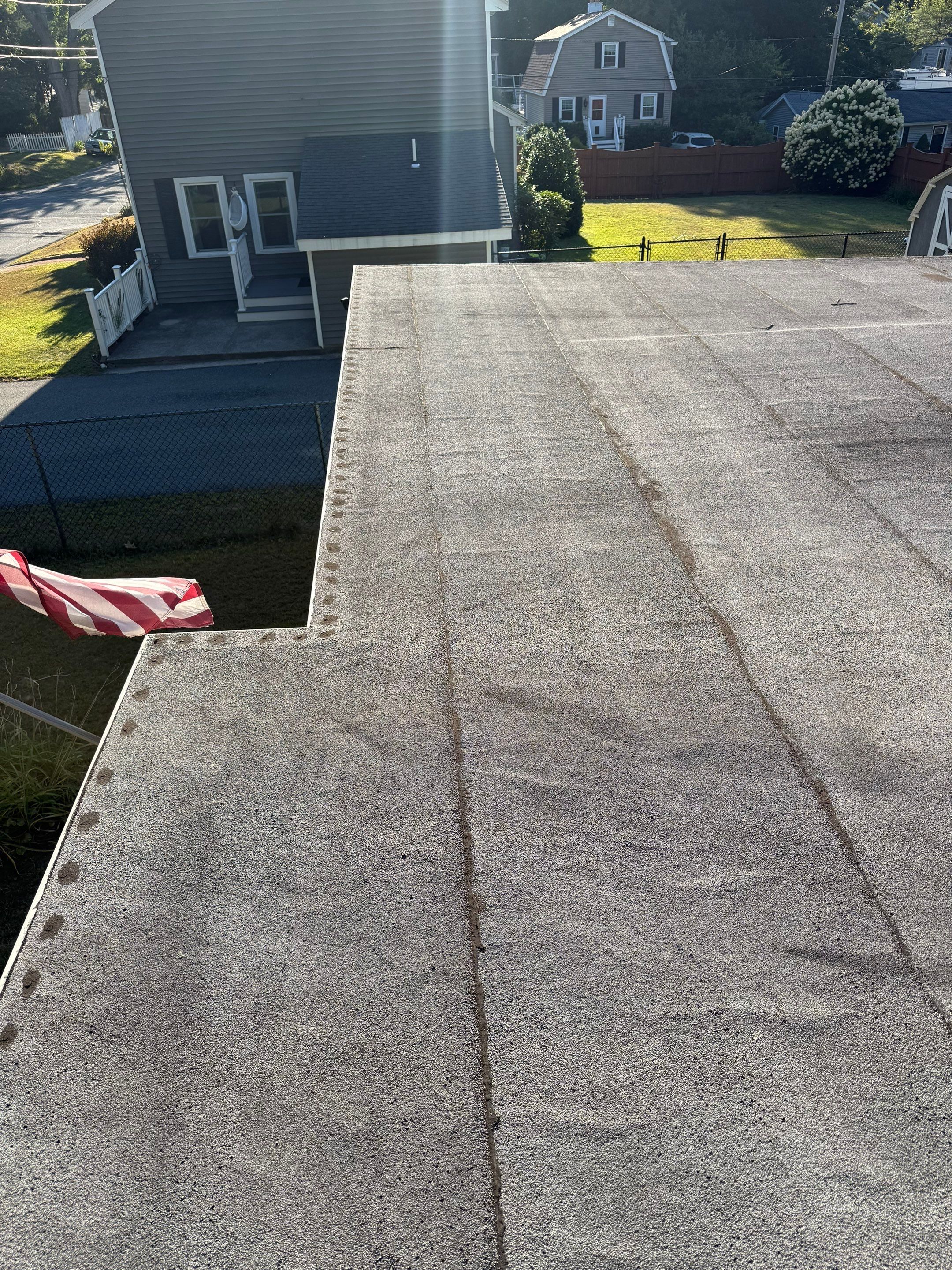 Westford EPDM Flat Roof with Gutter & Soffit/Fascia Replacement by Mighty Dog Roofing of Greater Middlesex County