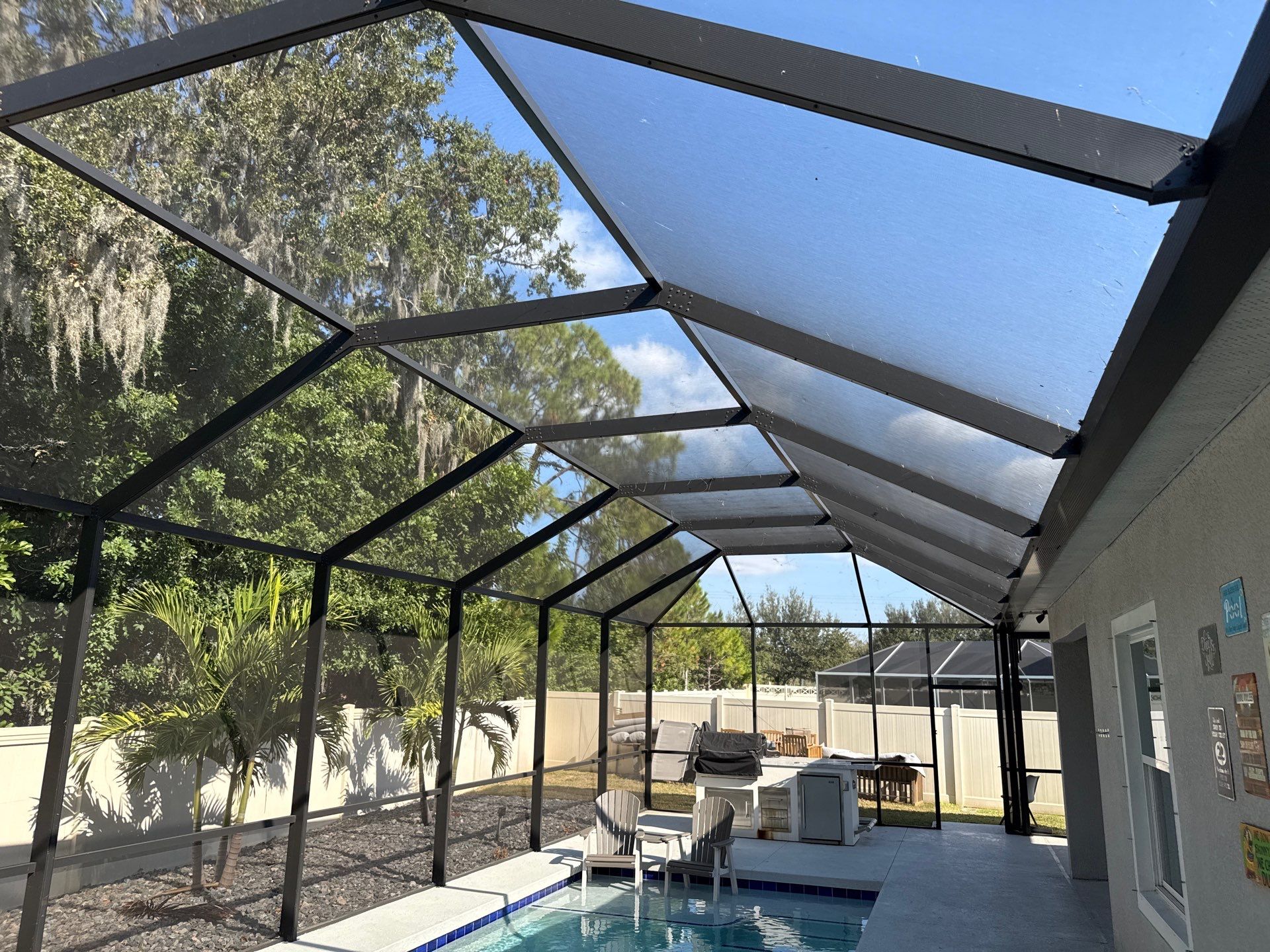 Painted Pool Deck & Screen Enclosure Cleaning | Heron Creek, Palmetto FL by Sunshine AquaWash